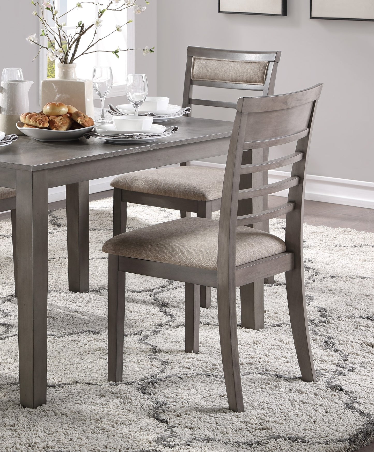 Gray wooden dining chair with upholstered seat and backrest perfect for modern homes