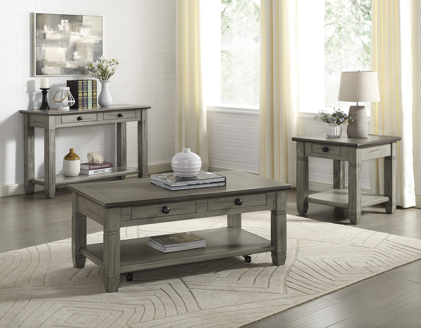Distressed grey wood coffee table with two drawers and a lower shelf