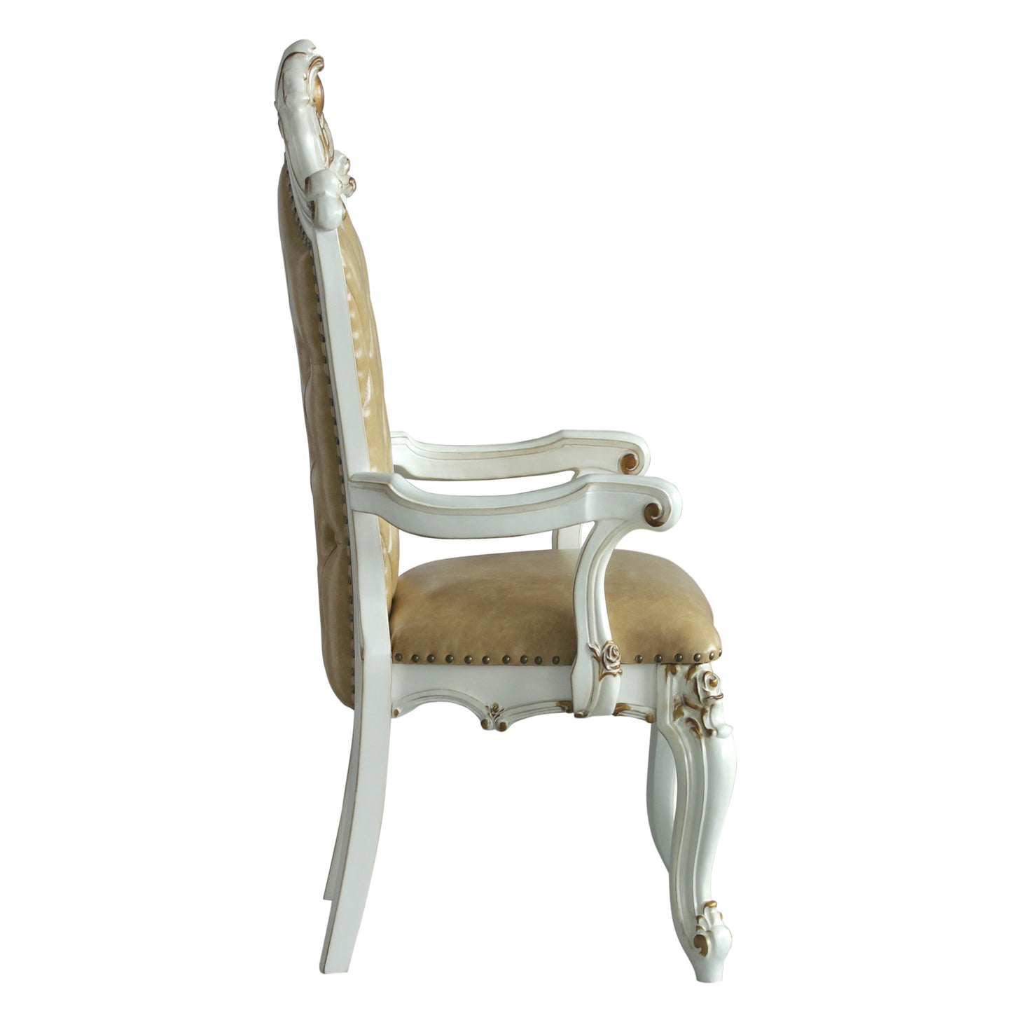 Ornate white wood armchair with tufted tan leather upholstery and gold accents
