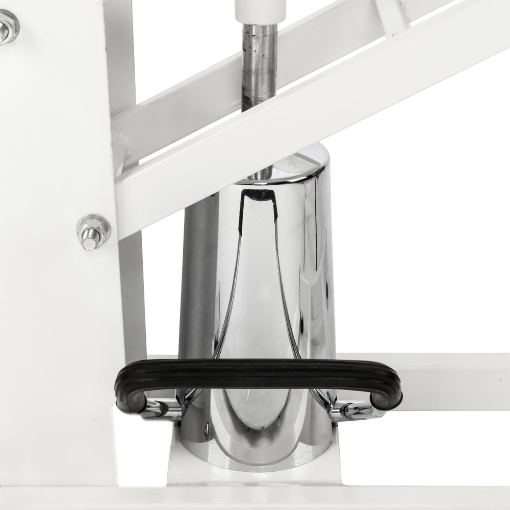 Shiny chrome tamping tool with a black rubber handle on a white metal base