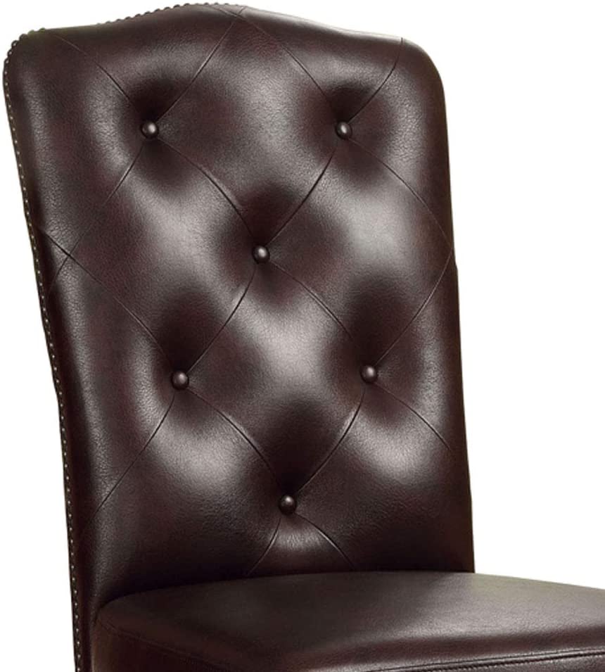 Dark brown tufted leather dining chair with nailhead trim details