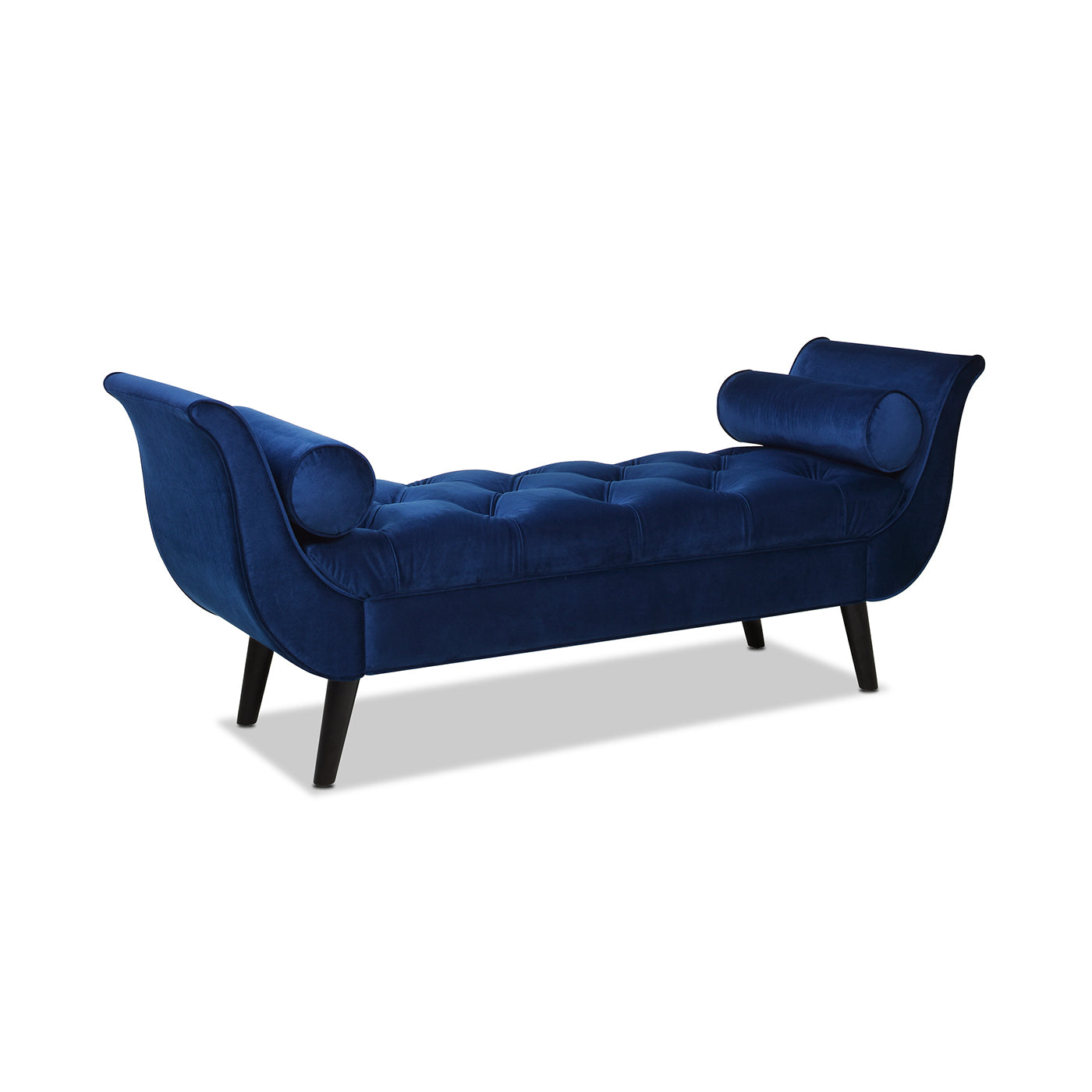 Deep blue velvet chaise lounge with tufted seating and rolled arms
