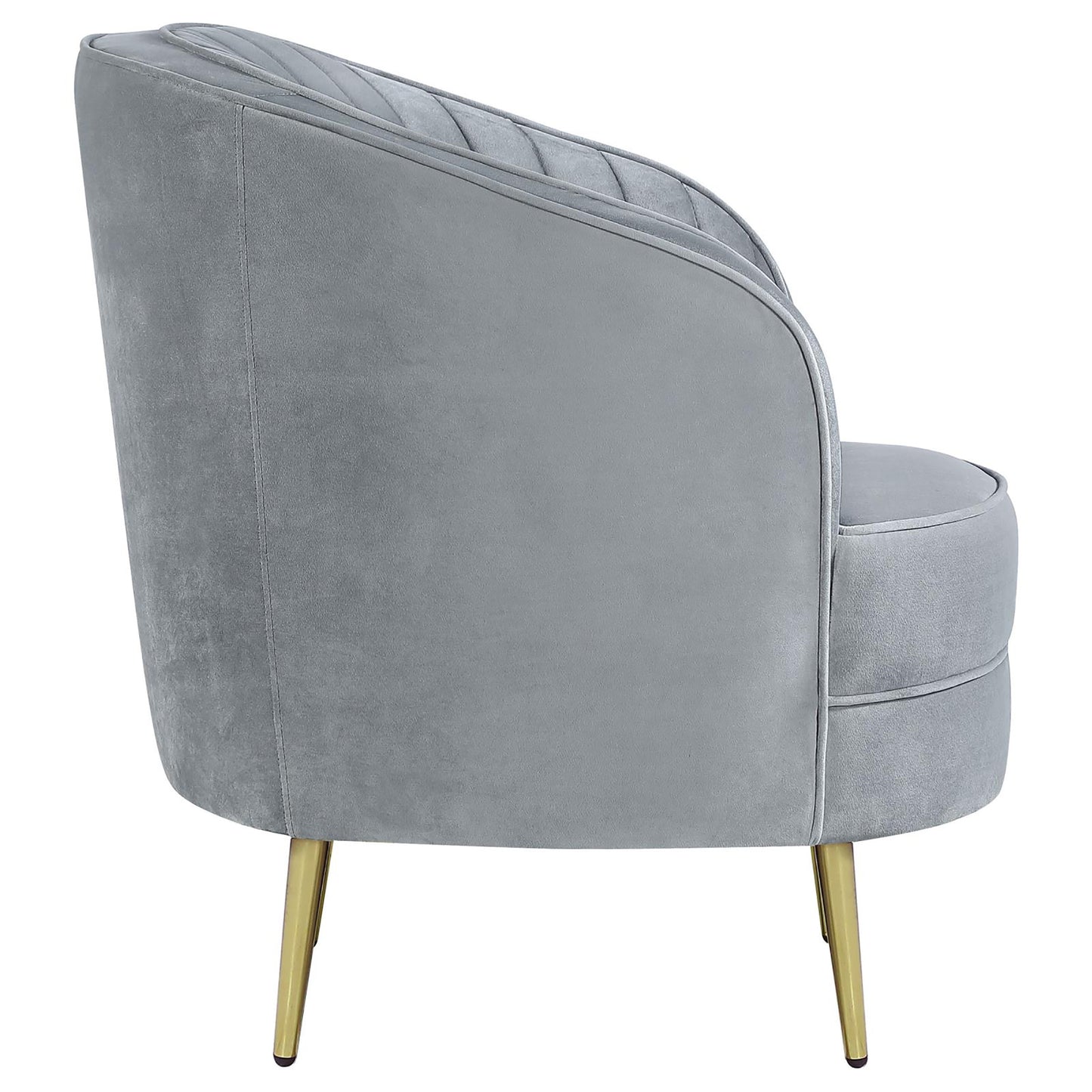 Grey velvet accent chair with channel tufting and gold metal legs