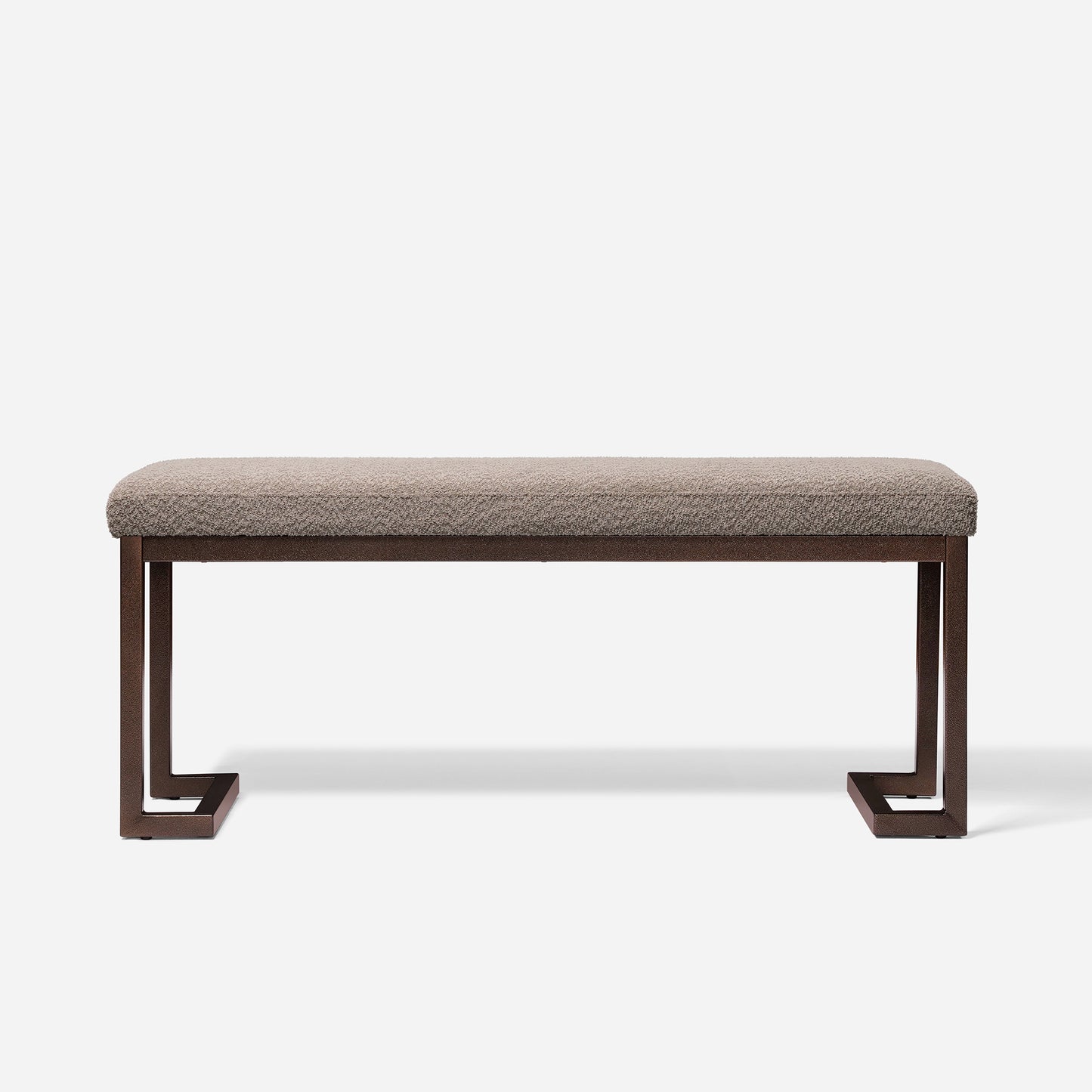 Textured beige upholstered bench with modern dark bronze metal frame