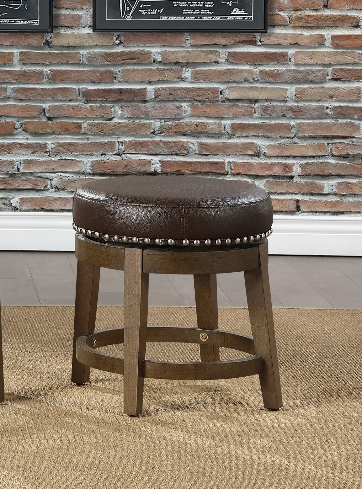 Dark brown faux leather swivel bar stool with nailhead trim and wooden base