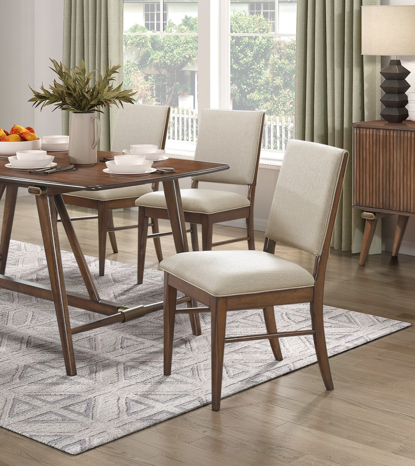 Wooden dining chair with light beige upholstered seat and back