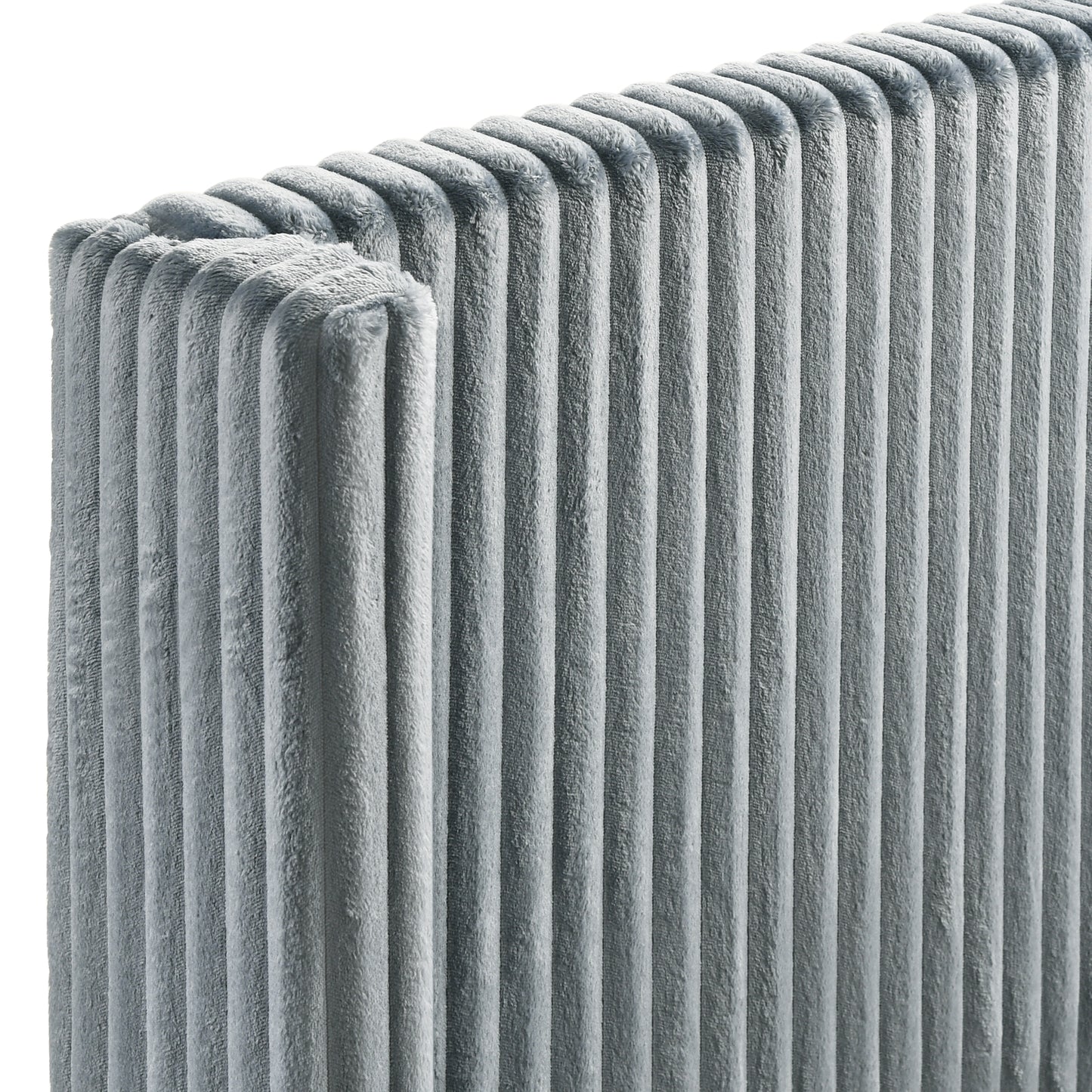 Plush grey corduroy fabric texture closeup ideal for upholstery or soft furnishings