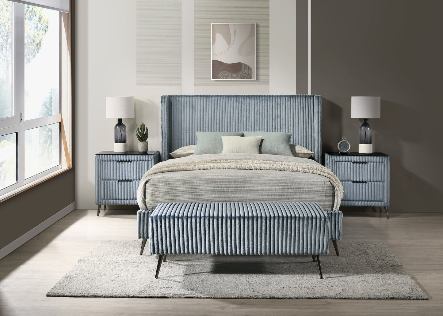 Upholstered grey velvet bench with ridged design and tapered legs