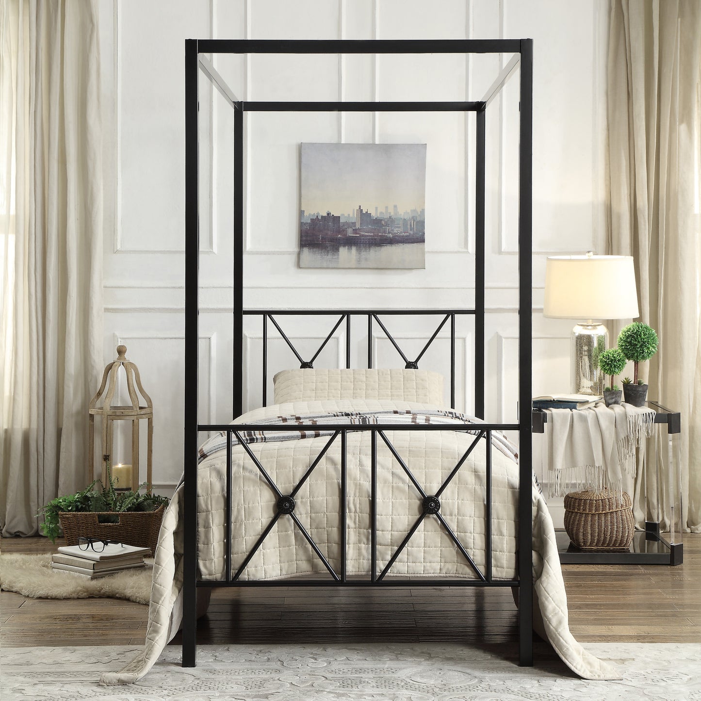 Black metal canopy bed frame with diamond pattern headboard and footboard