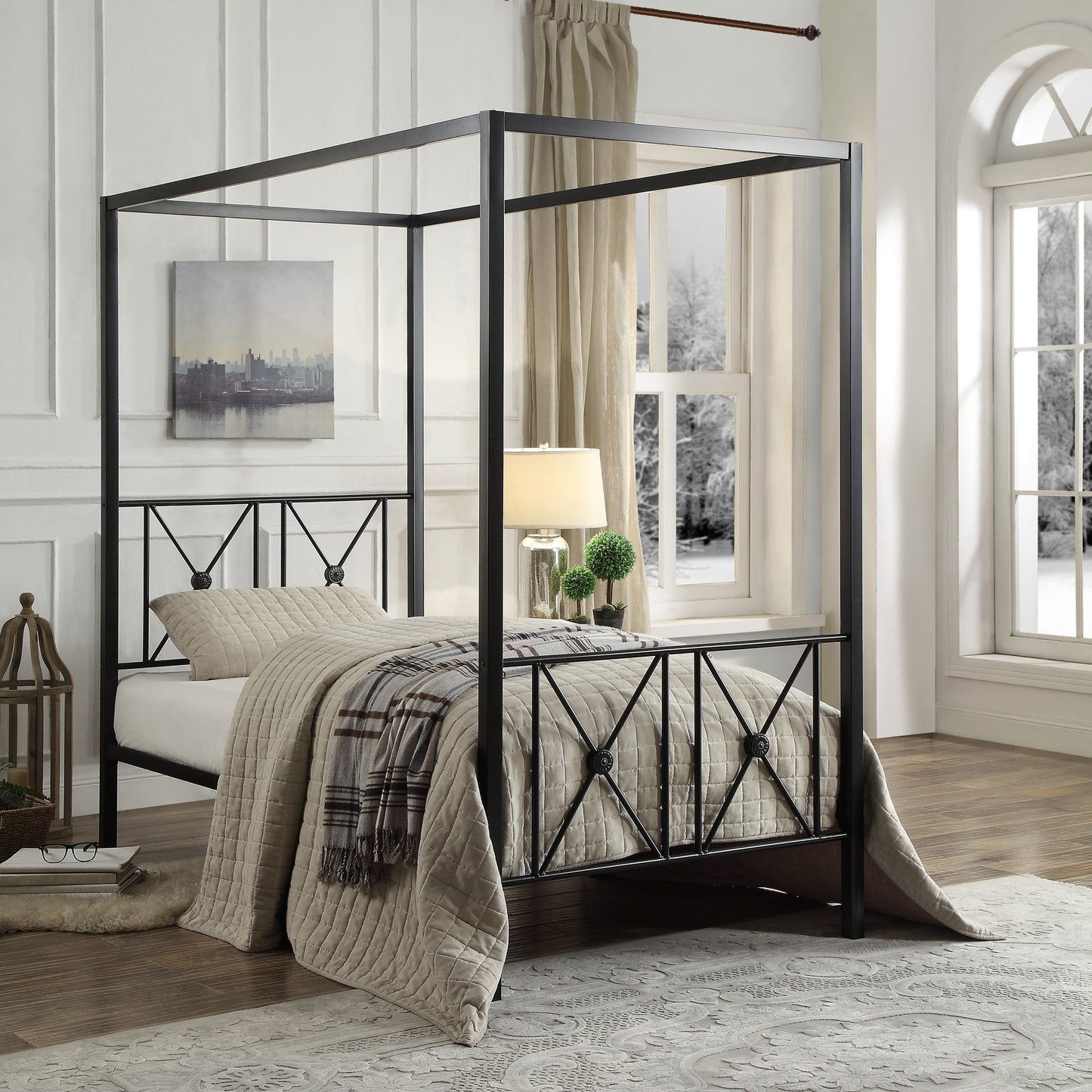 Black metal canopy bed frame with diamond pattern headboard and footboard
