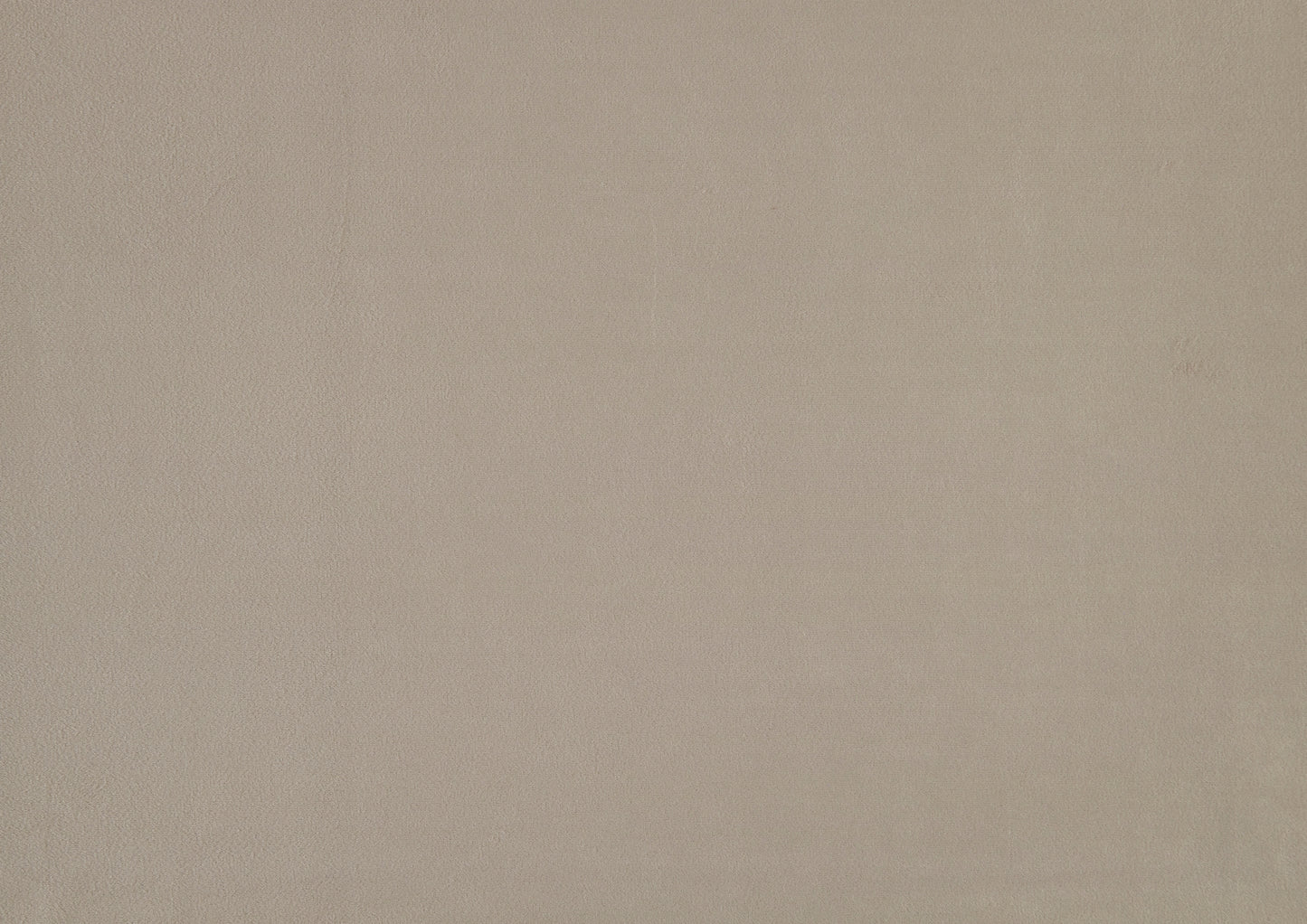 Closeup texture of taupe suede fabric for upholstery
