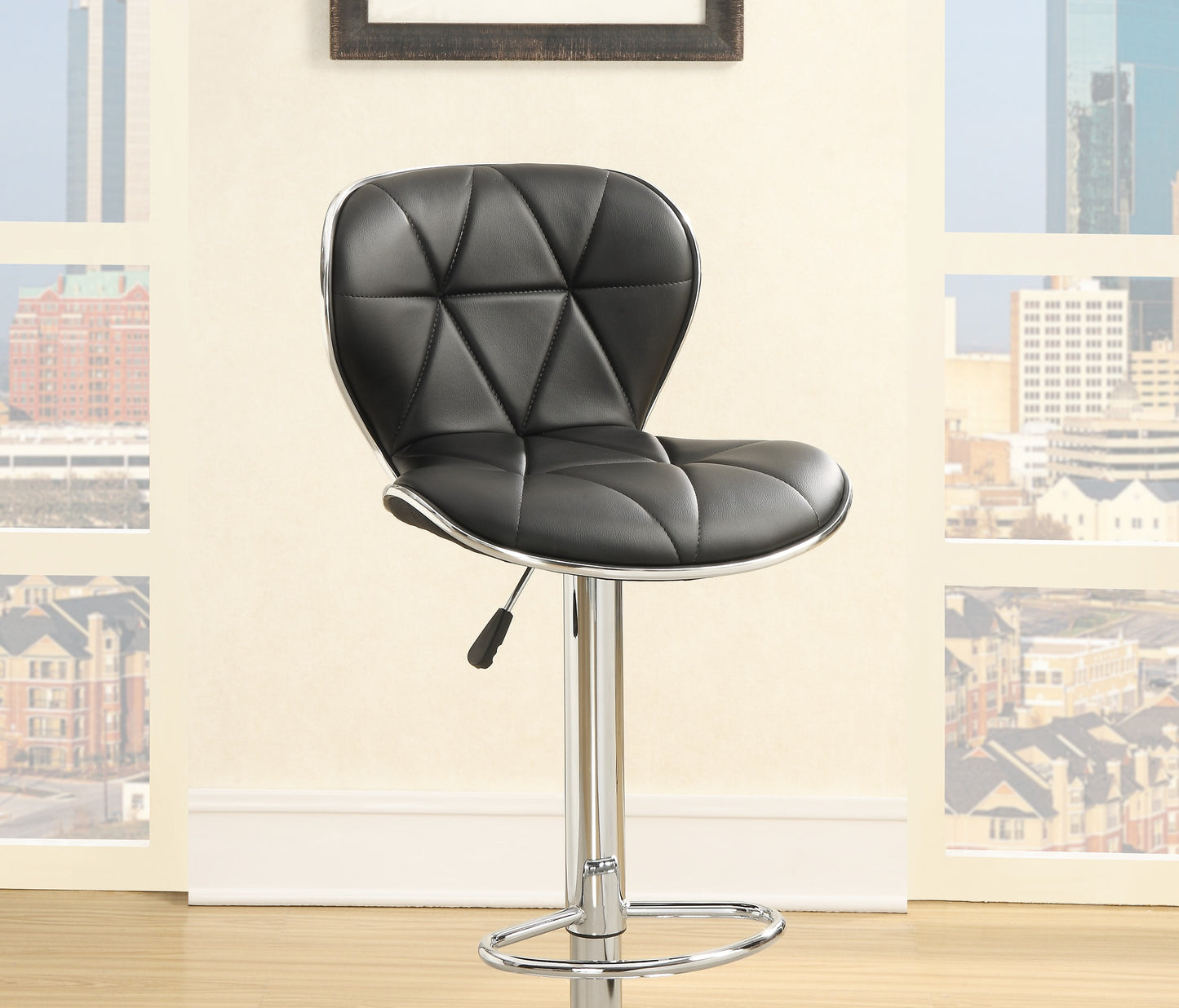 Black faux leather bar stool with diamond stitching and chrome base ideal for modern kitchens