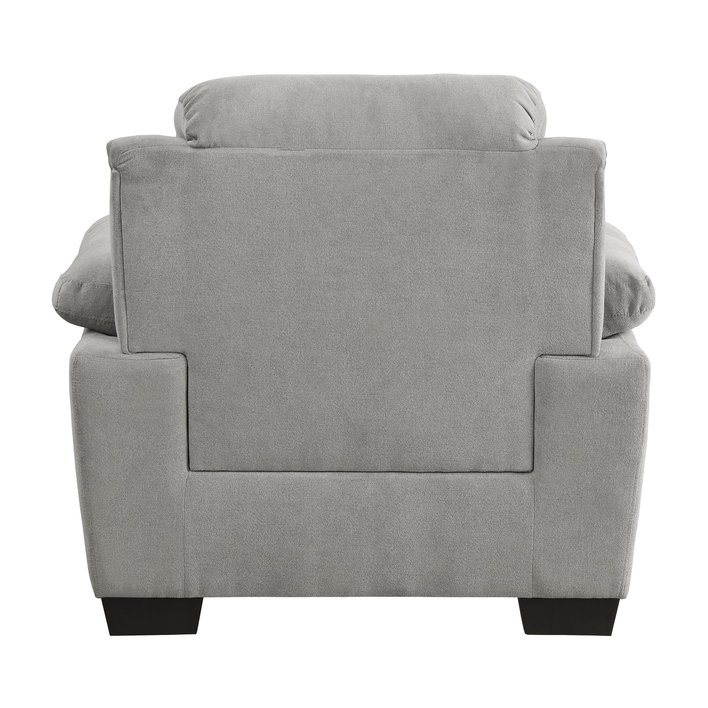 Rear view of a plush gray fabric armchair with a square back and padded headrest