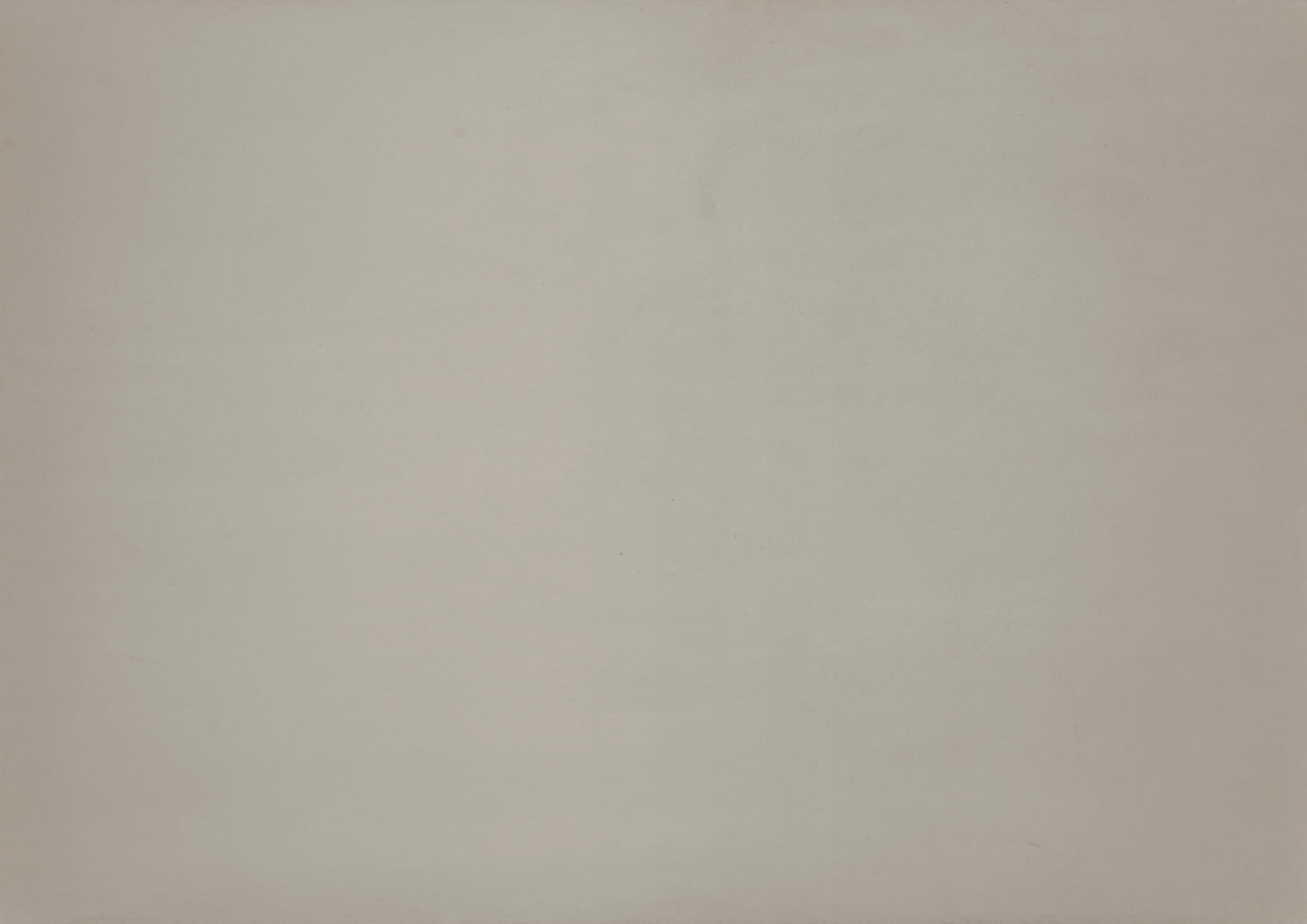 A closeup of a plain light beige textured background suitable for product backdrops