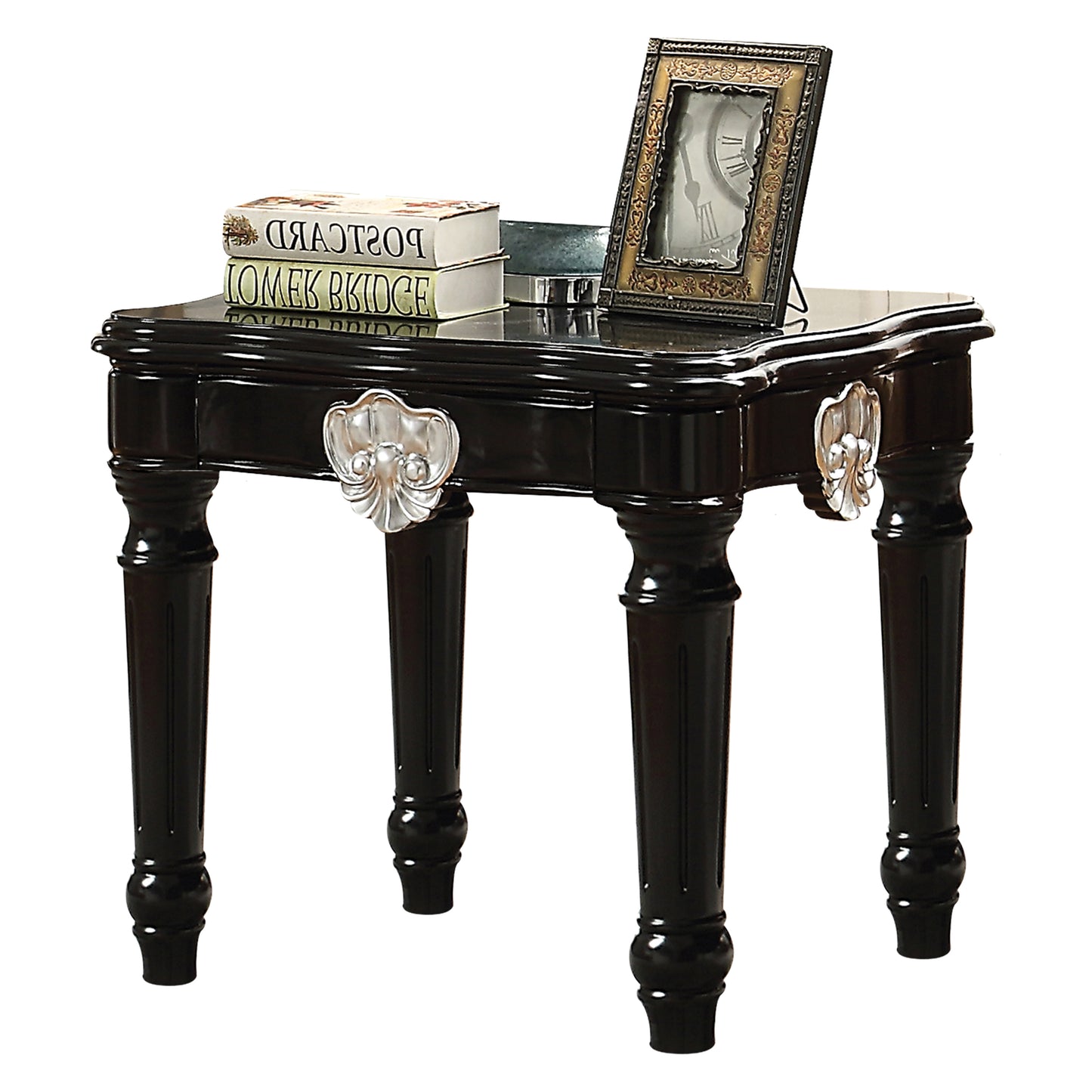 Glossy black accent table with ornate silver accents and turned legs