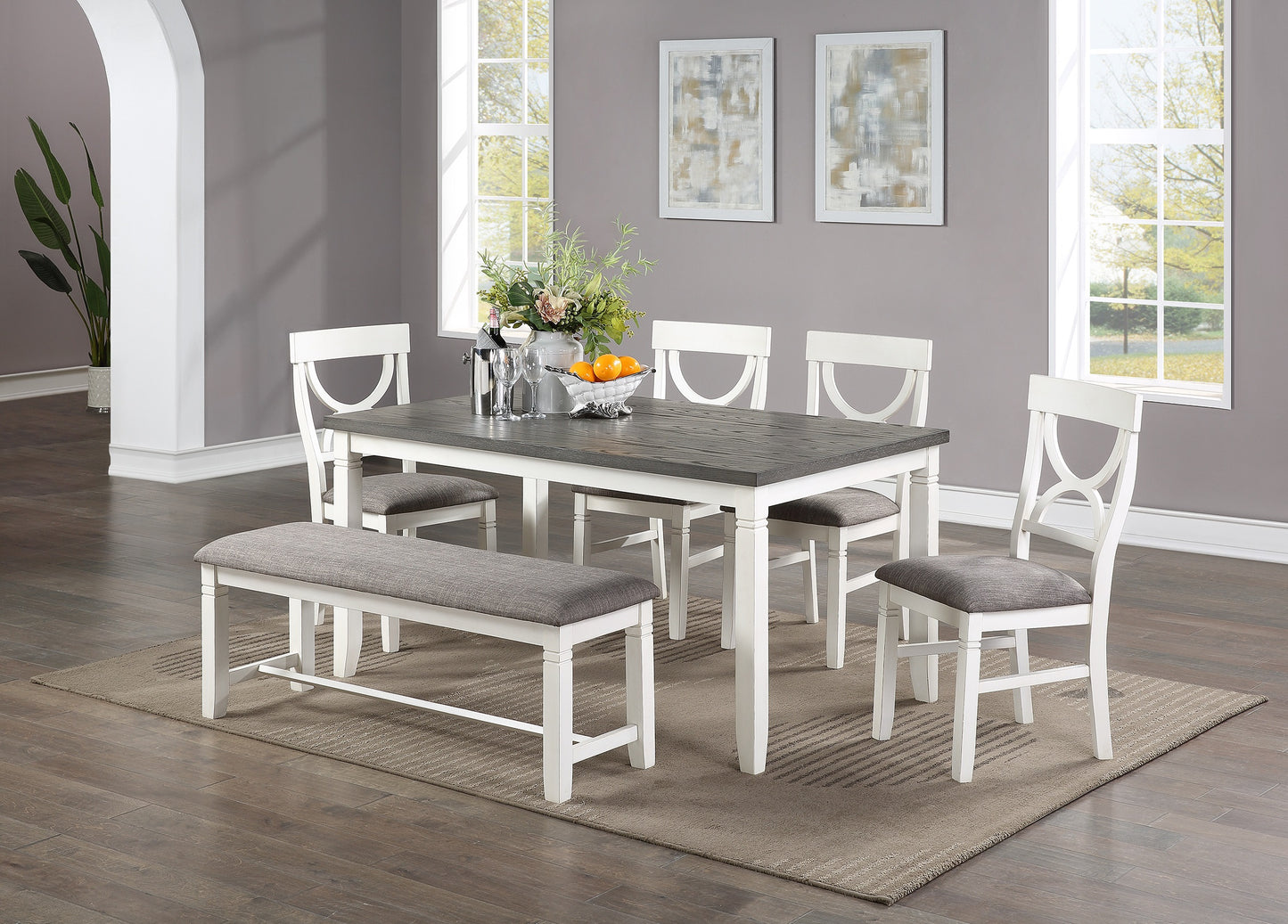White and gray farmhouse dining set with wooden tabletop and upholstered bench