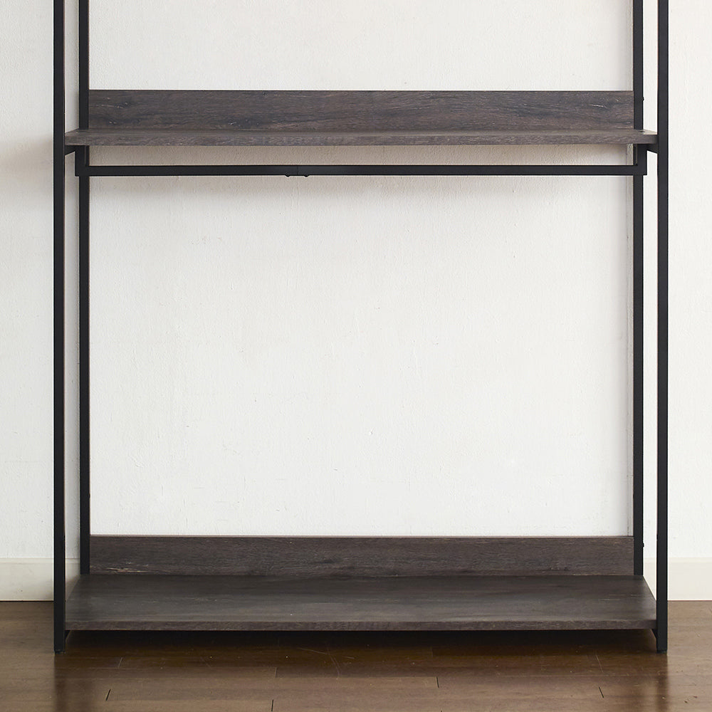 Industrial pipe clothing rack with dark wood shelves