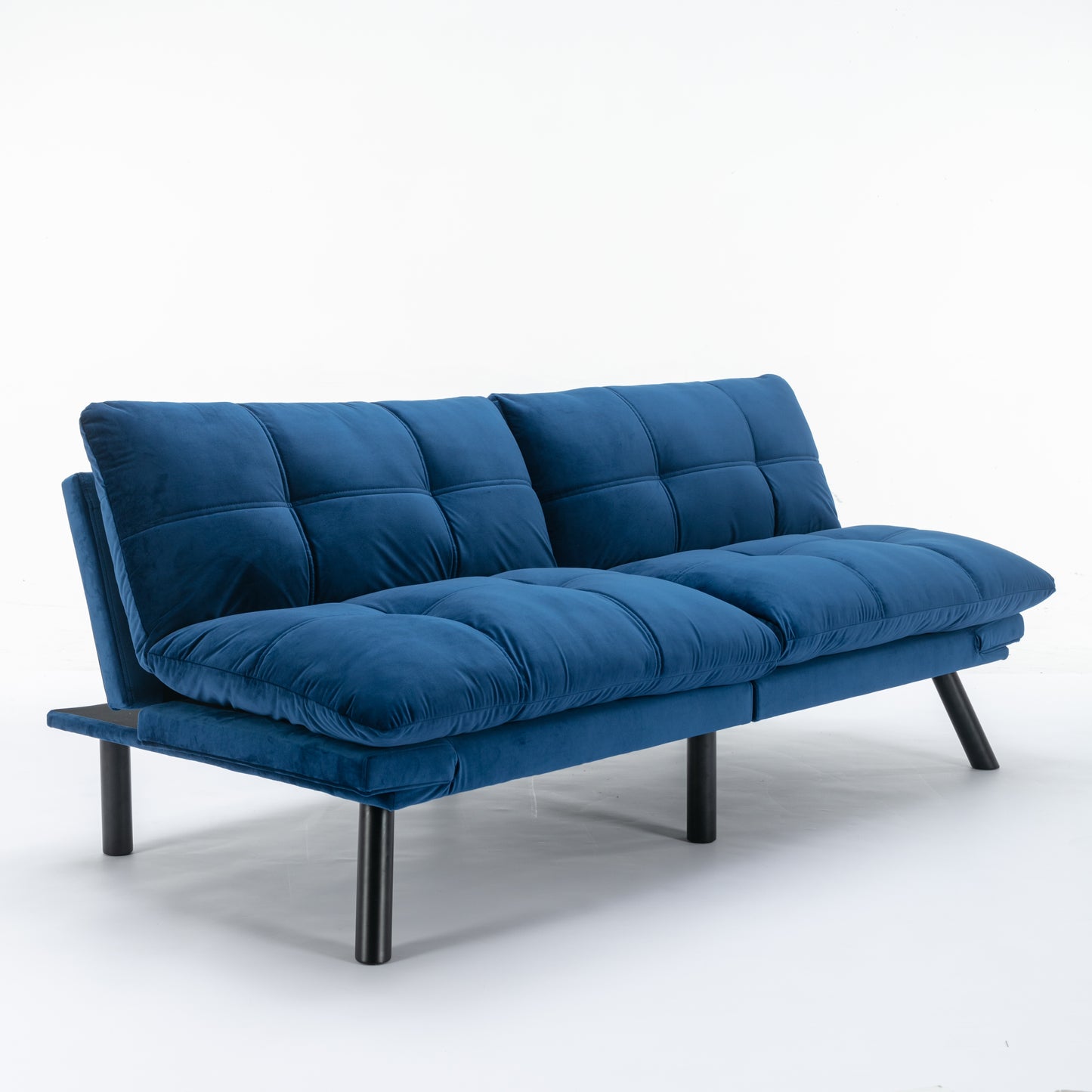 Tufted navy blue velvet futon sofa with modern black metal legs perfect for small spaces