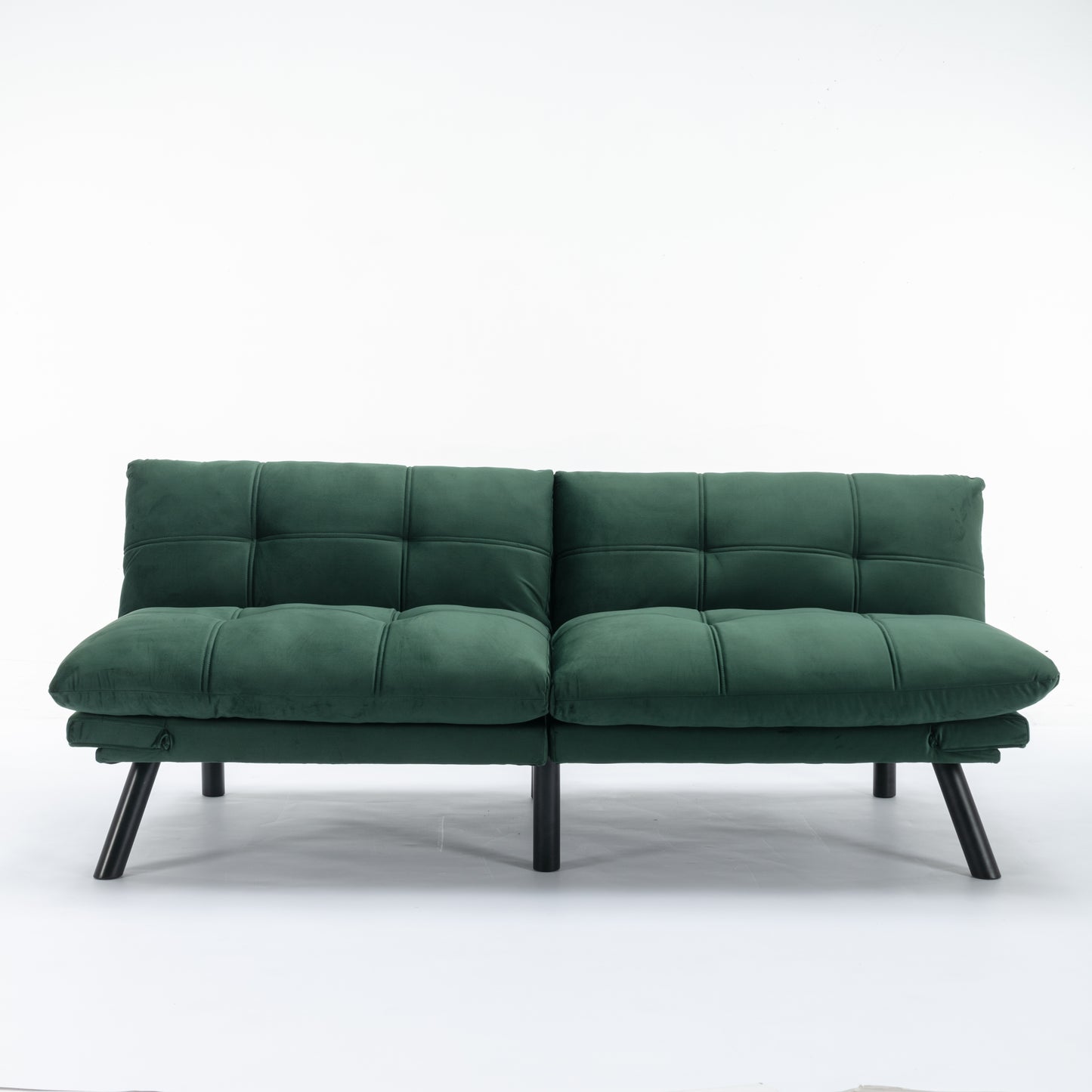 Deep green velvet futon sofa with tufted cushions and black legs