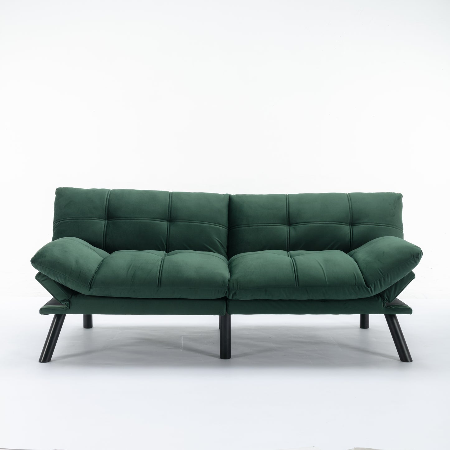Deep green velvet tufted futon sofa with black metal legs perfect for small spaces