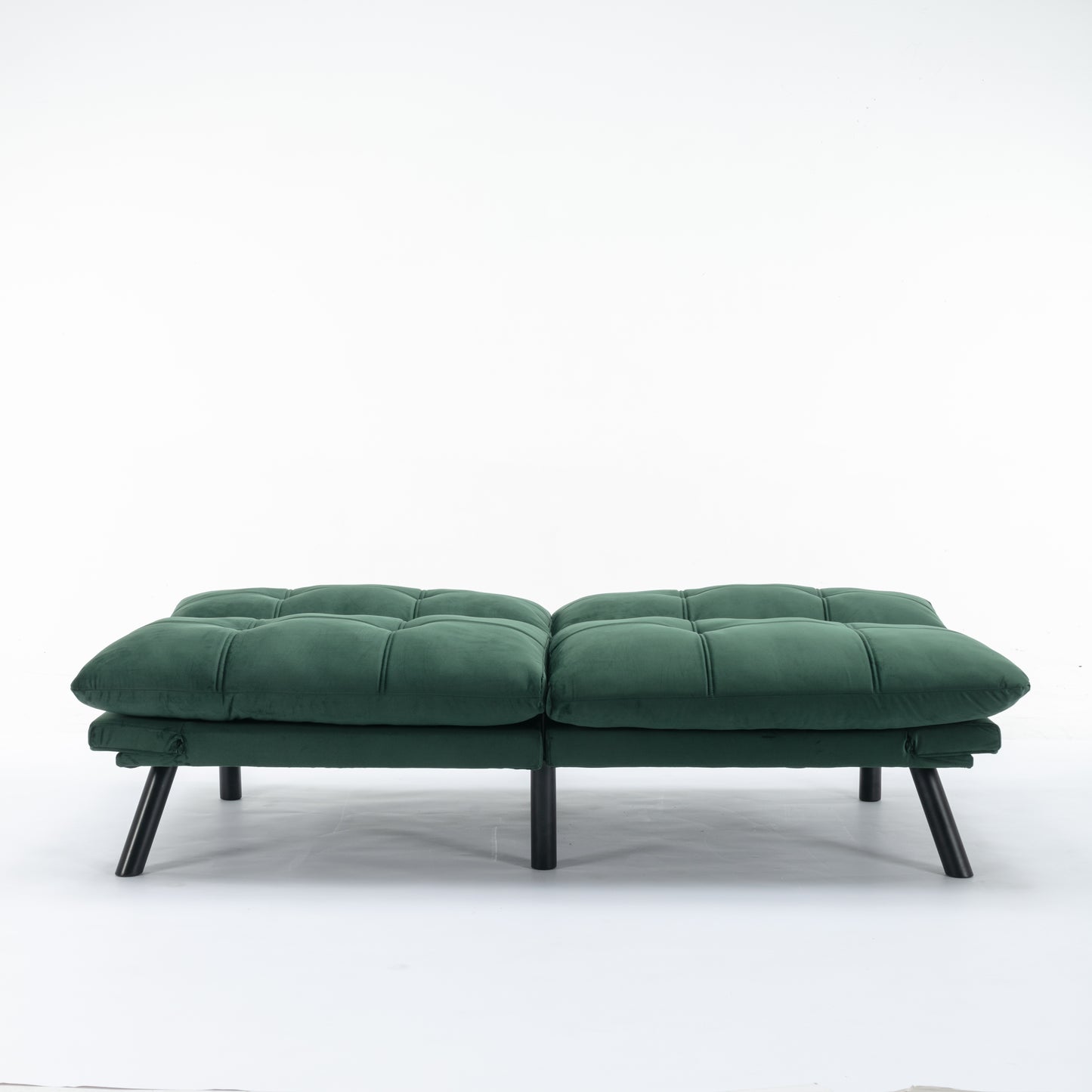 Emerald green velvet futon sofa with tufted cushions and black metal legs