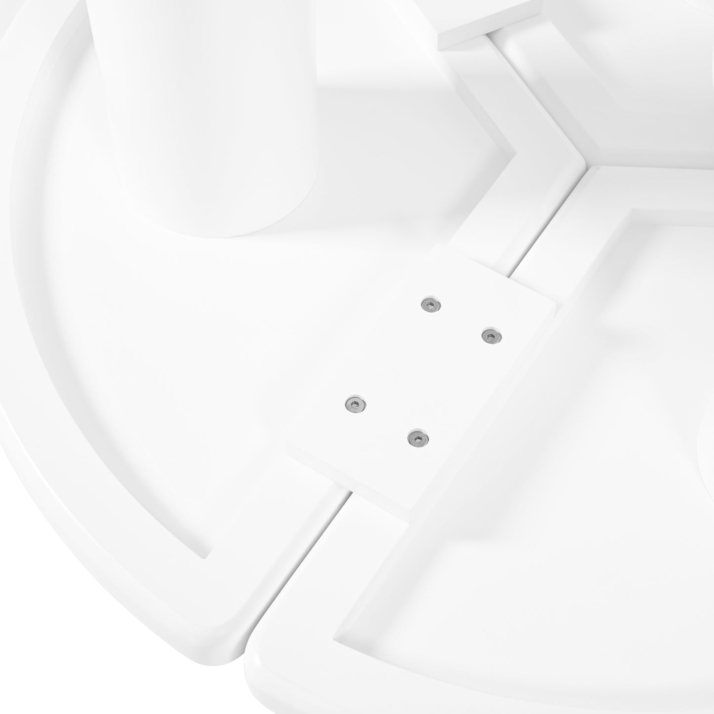Closeup of white plastic desk with hexagonal bolt heads and integrated leg support
