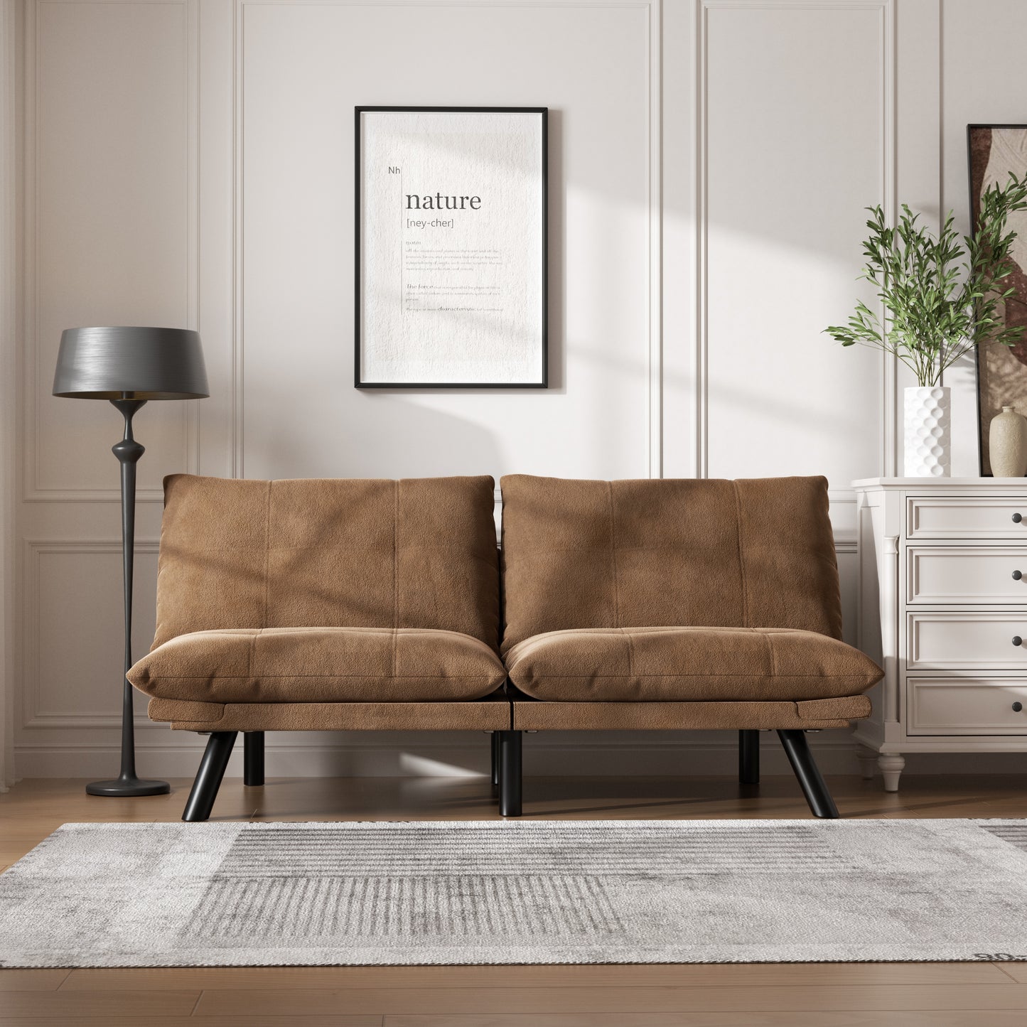 Brown velvet sofa with tufted cushions and black metal legs