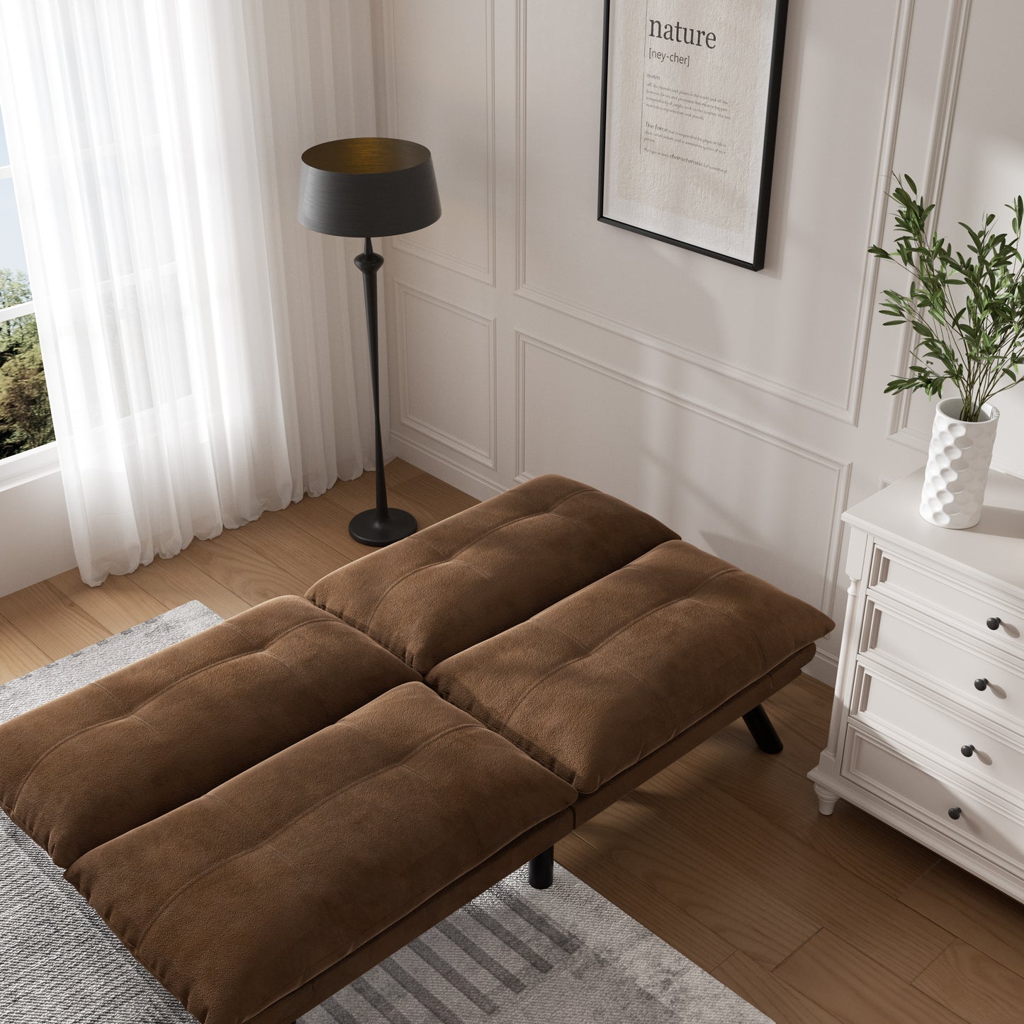 Brown tufted convertible sofa bed with plush fabric for a cozy living room