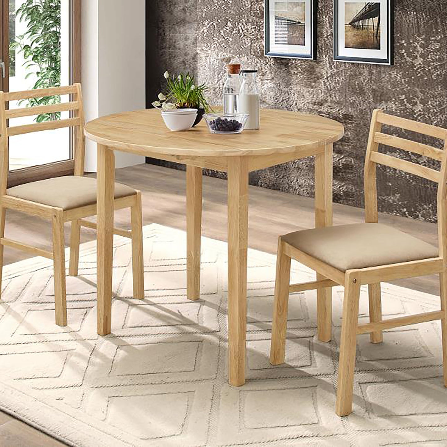 Round oak dining table with two beige upholstered chairs