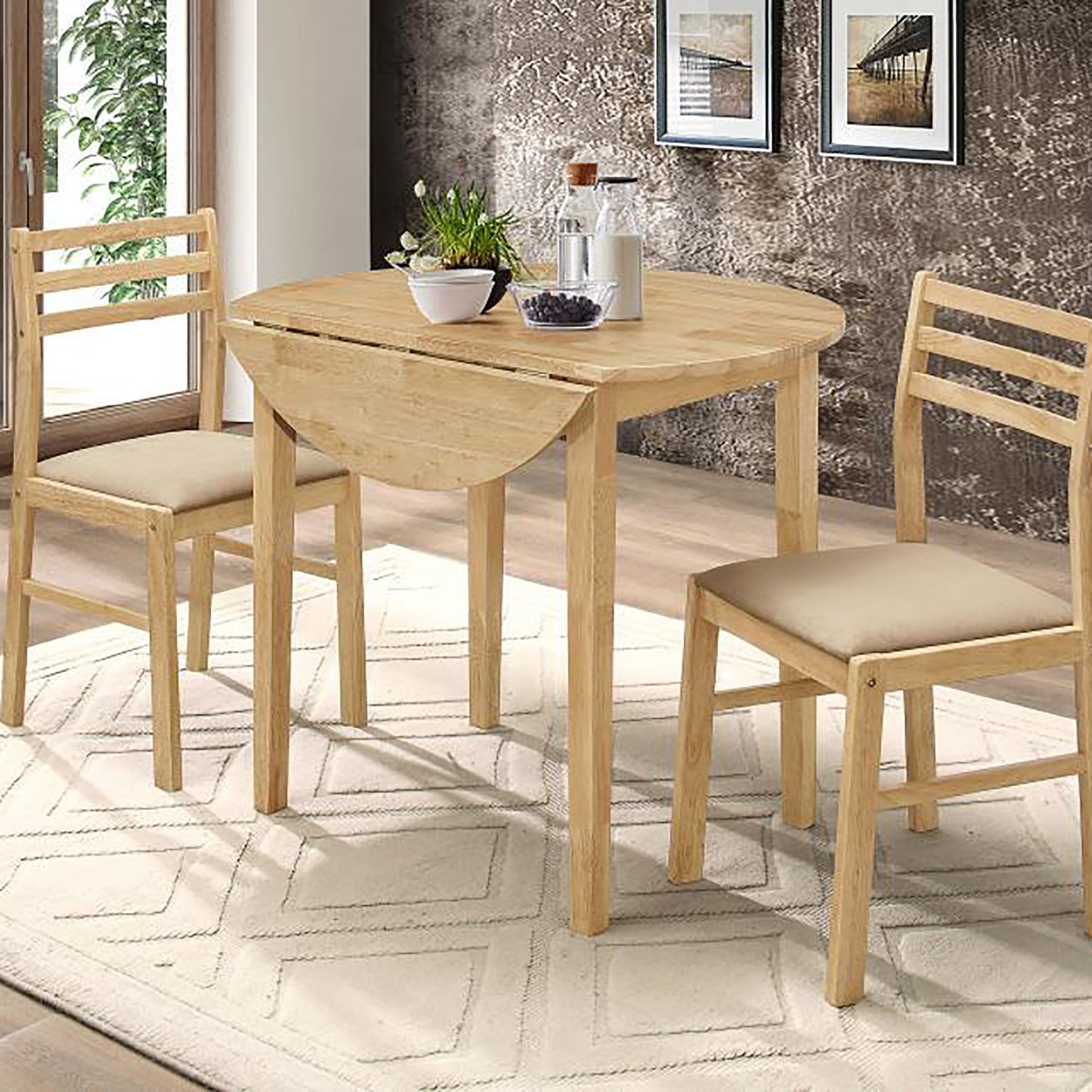 Round drop leaf dining table with two chairs natural wood finish ideal for small kitchens