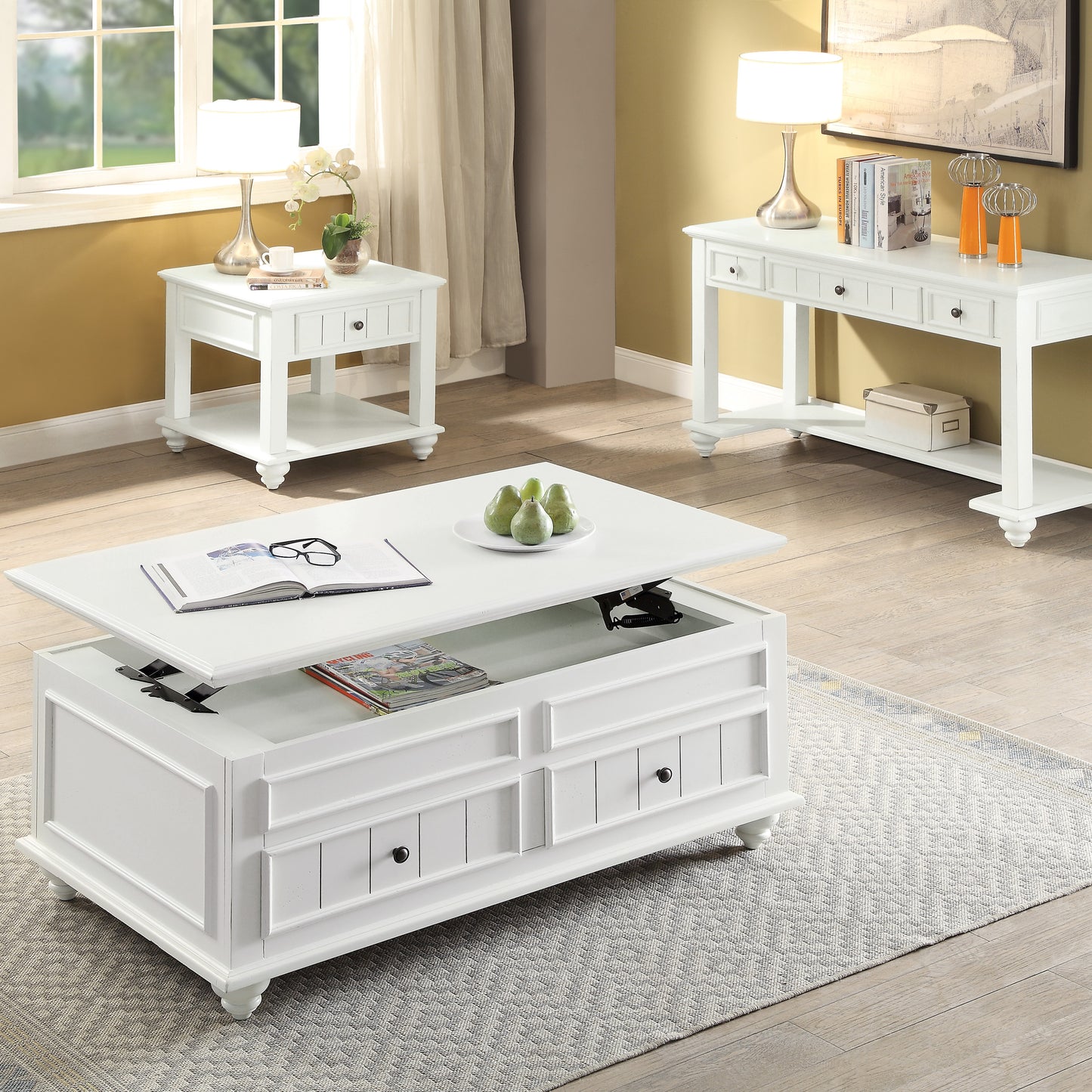 White lifttop coffee table with storage drawers open to reveal magazines and mechanism
