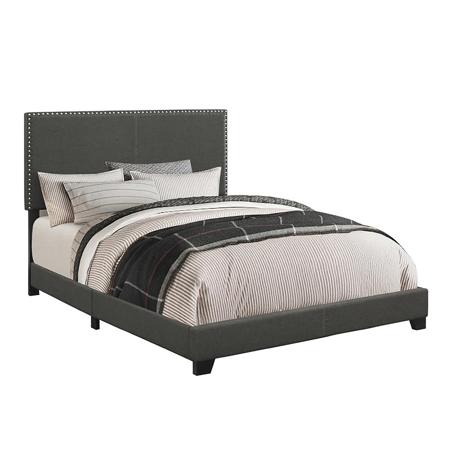 Upholstered queen bed frame in dark grey fabric with silver nailhead trim on headboard