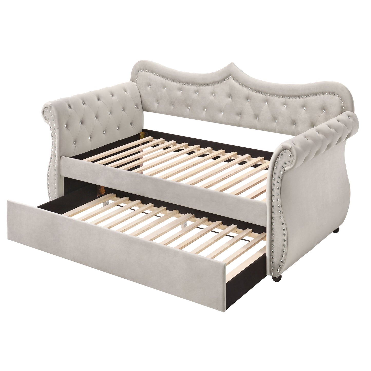 Elegant upholstered daybed with a pullout trundle and crystal tufting in beige velvet