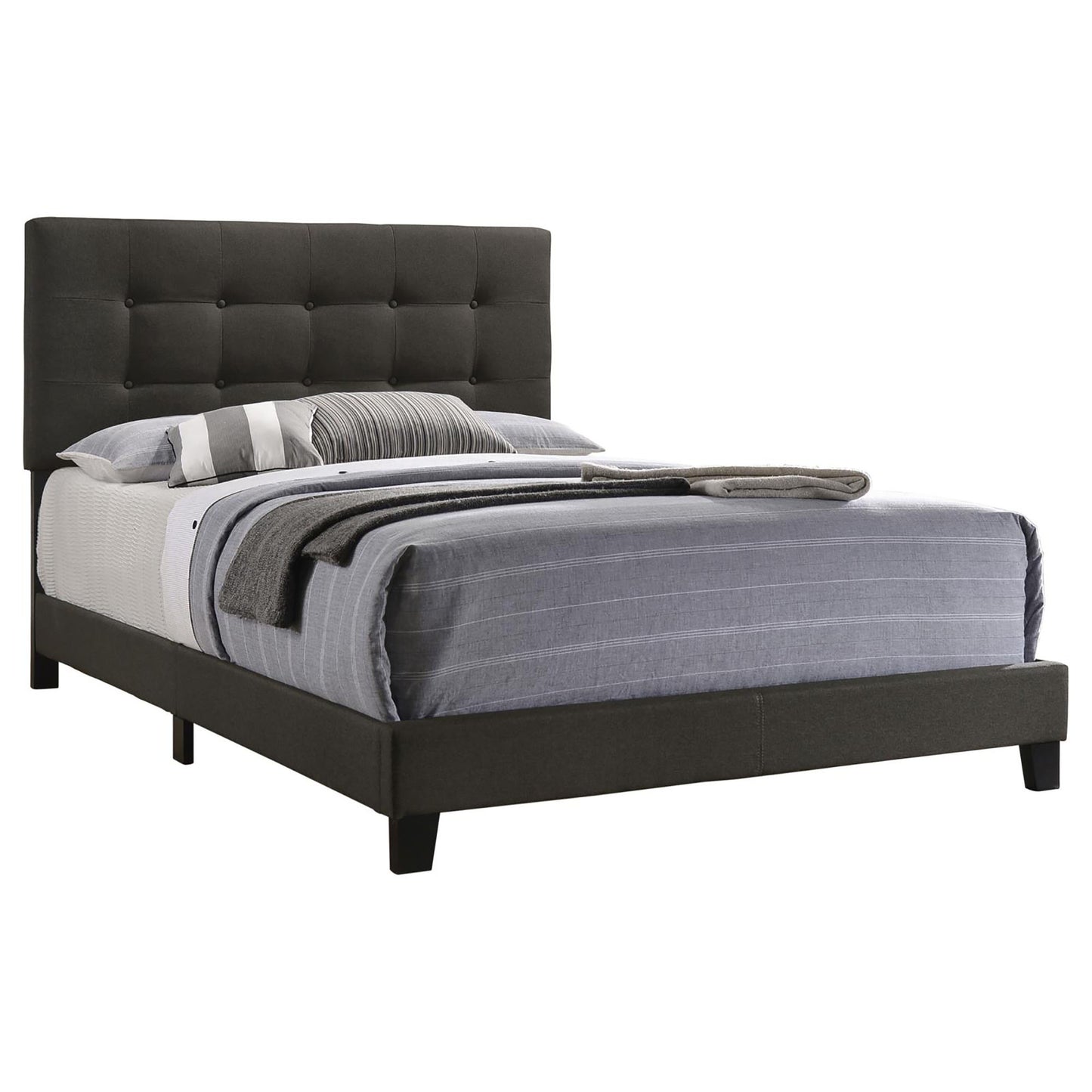 Dark gray upholstered queen bed frame with tufted headboard and bedding