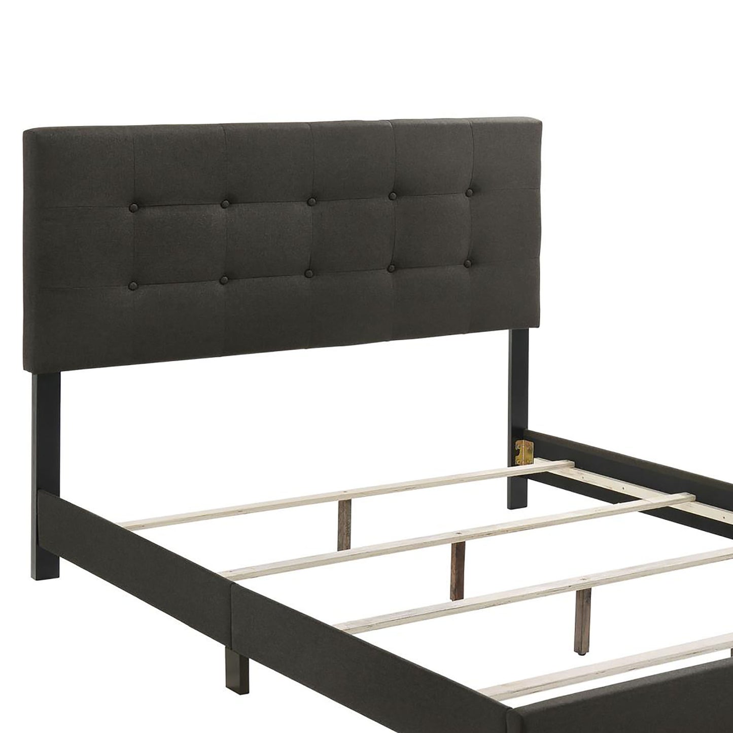 Dark grey fabric headboard bed frame with button tufting and wooden slats for mattress support
