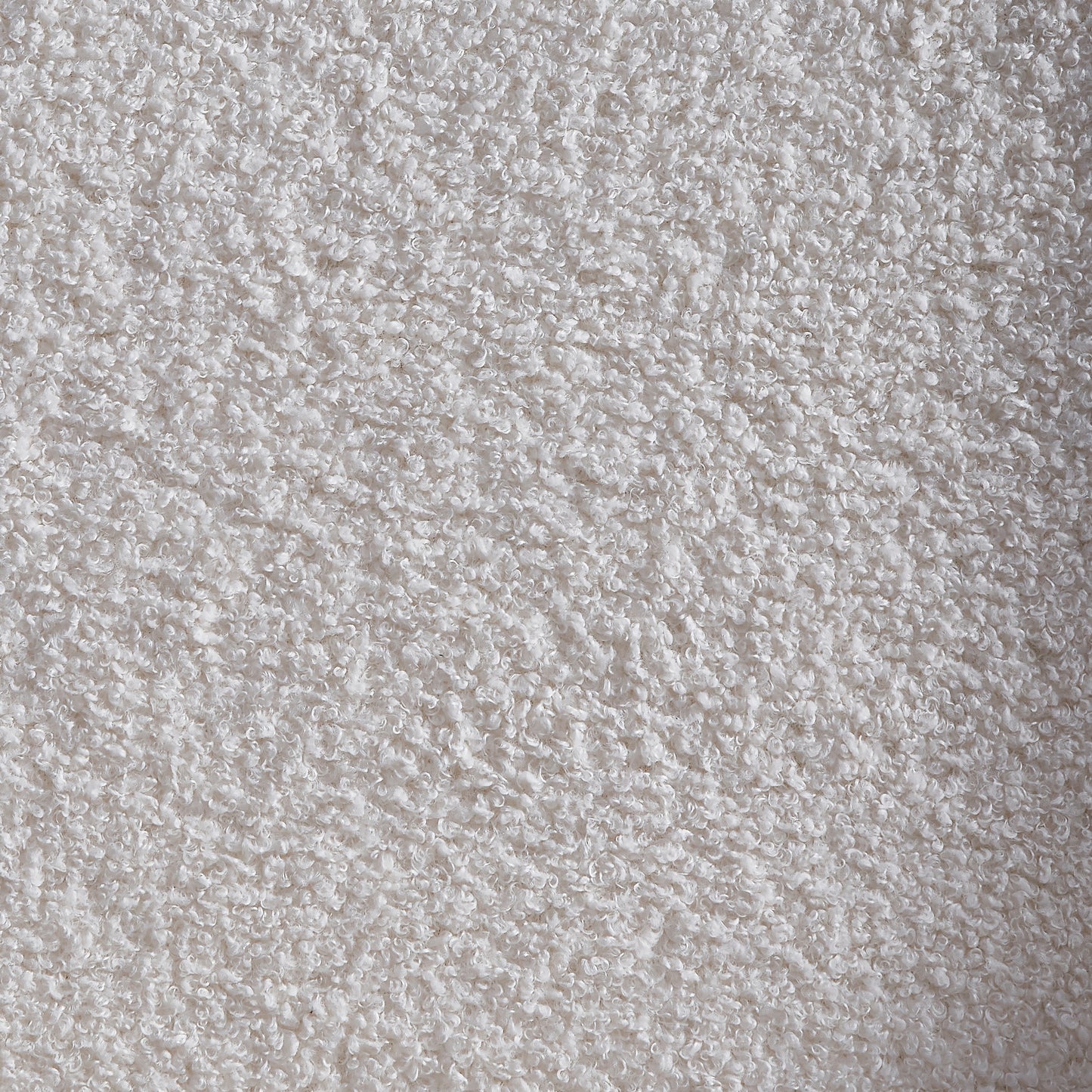 Cream boucle fabric texture closeup perfect for upholstery projects