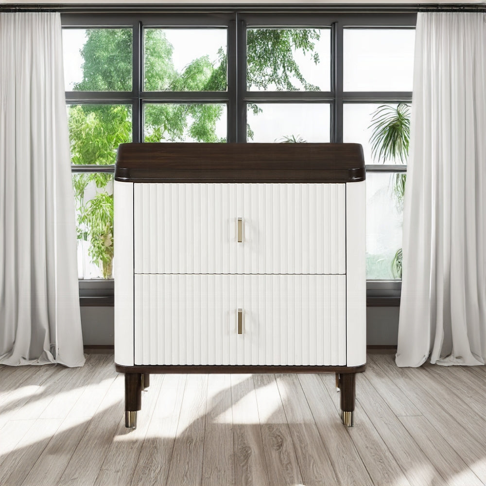 Modern twodrawer nightstand in white with fluted front and dark wood top