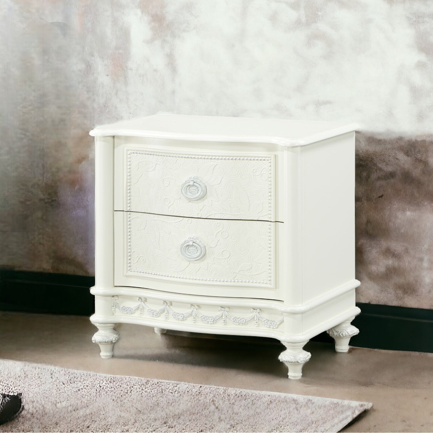 Elegant white twodrawer nightstand with decorative carving a classic bedroom accent