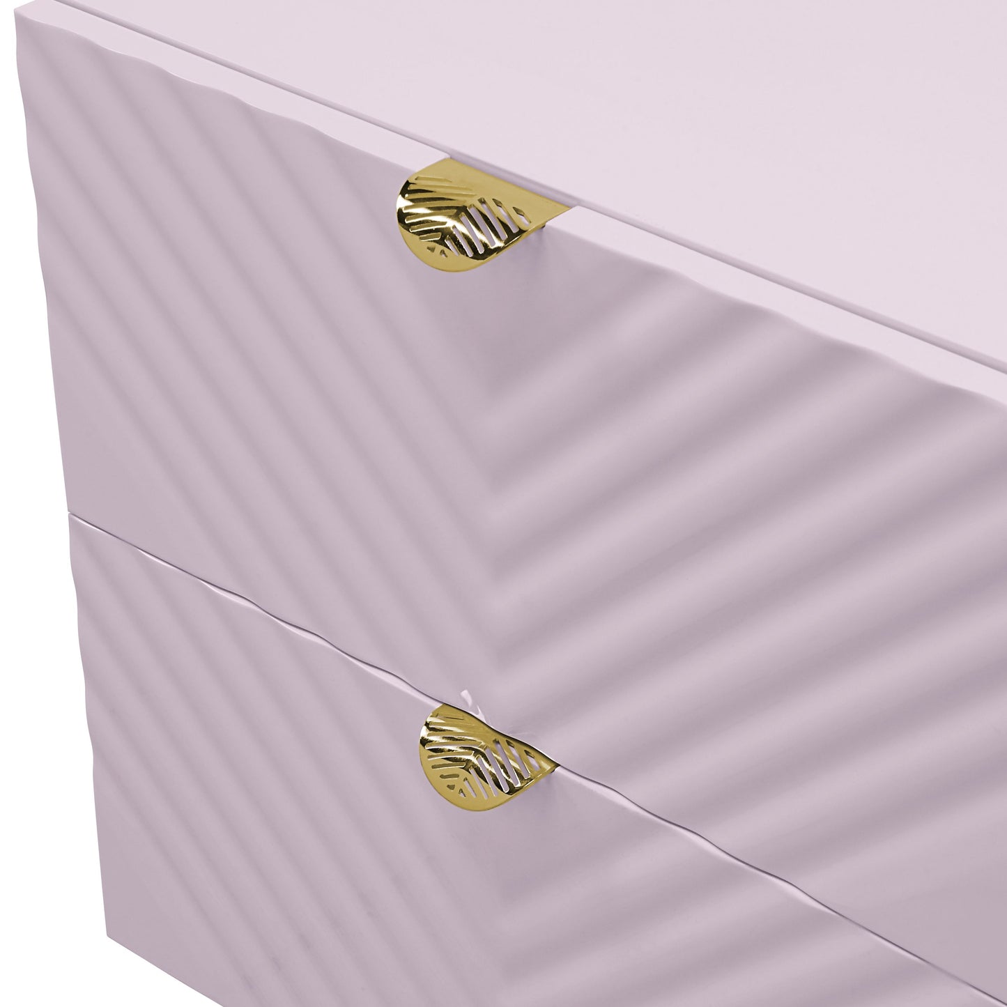 Light pink dresser with chevron texture and ornate gold leaf drawer pulls