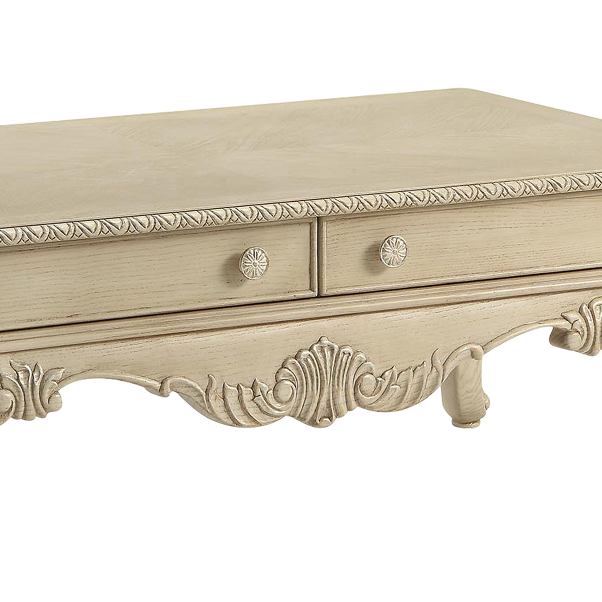 Antique cream wooden vanity table with ornate carvings and two drawers