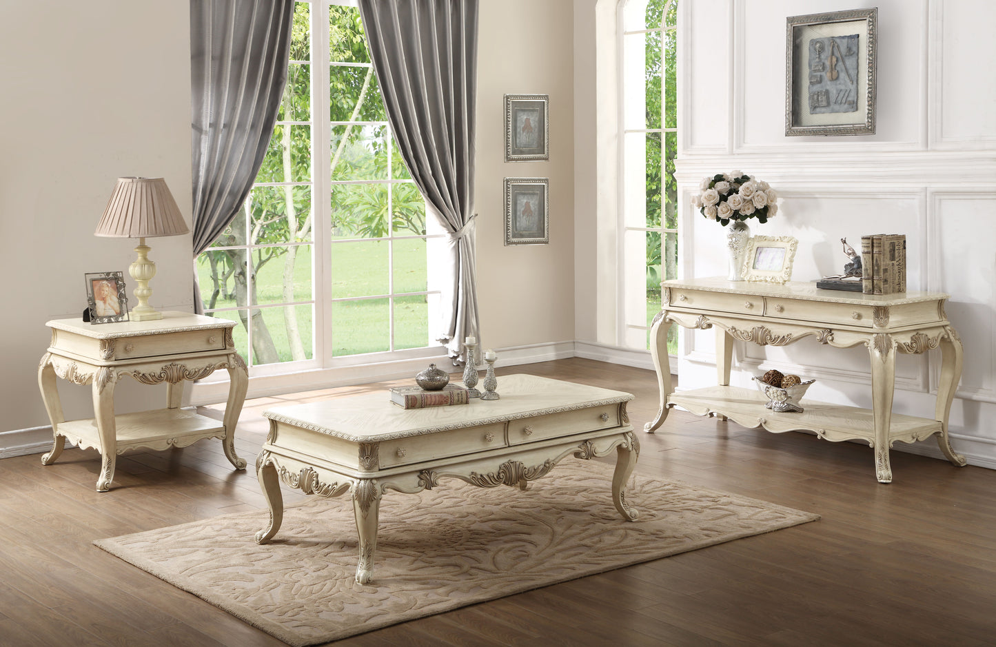 Ornate antique white coffee table with carved detailing fitting for a classic living room