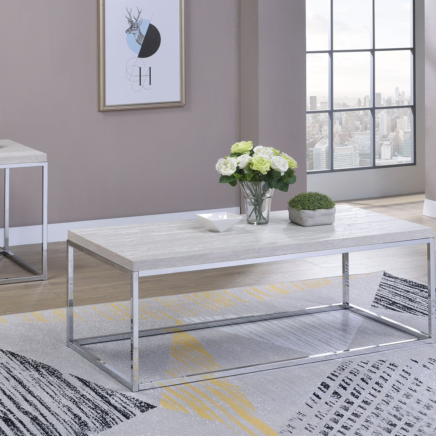 Modern rectangular coffee table with faux marble top and chrome metal frame