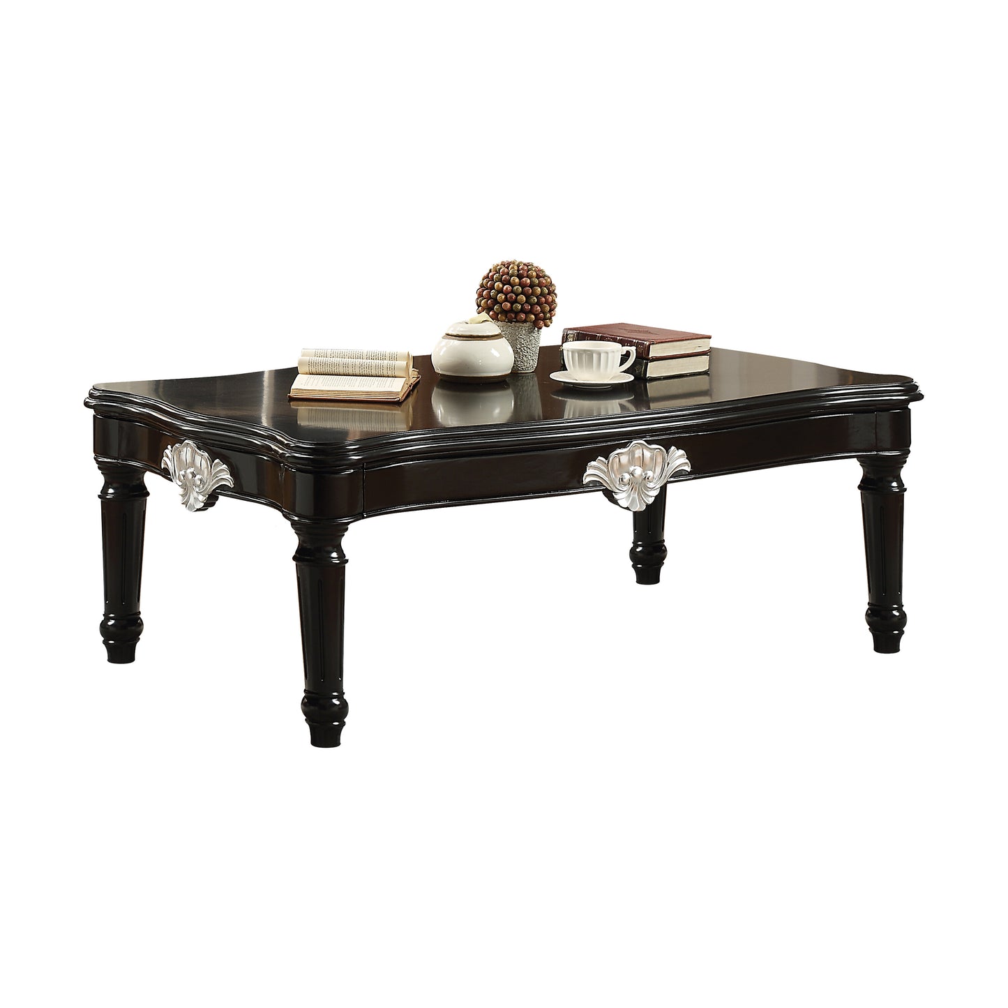 Elegant dark wood coffee table with carved legs and silver accents