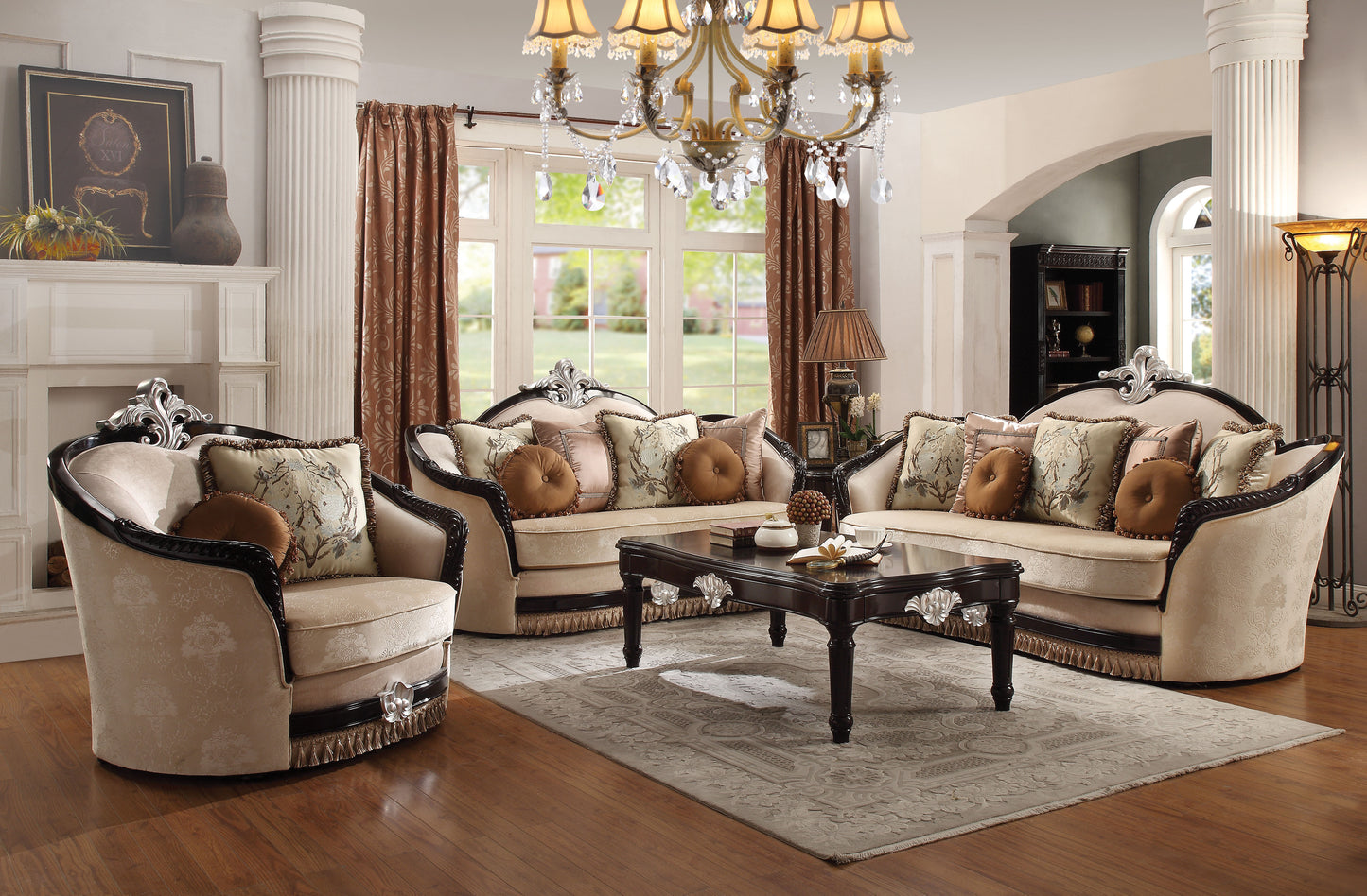 Elegant cream sofa set with intricately patterned cushions a dark wood frame and silver ornate detailing perfect for a formal living room