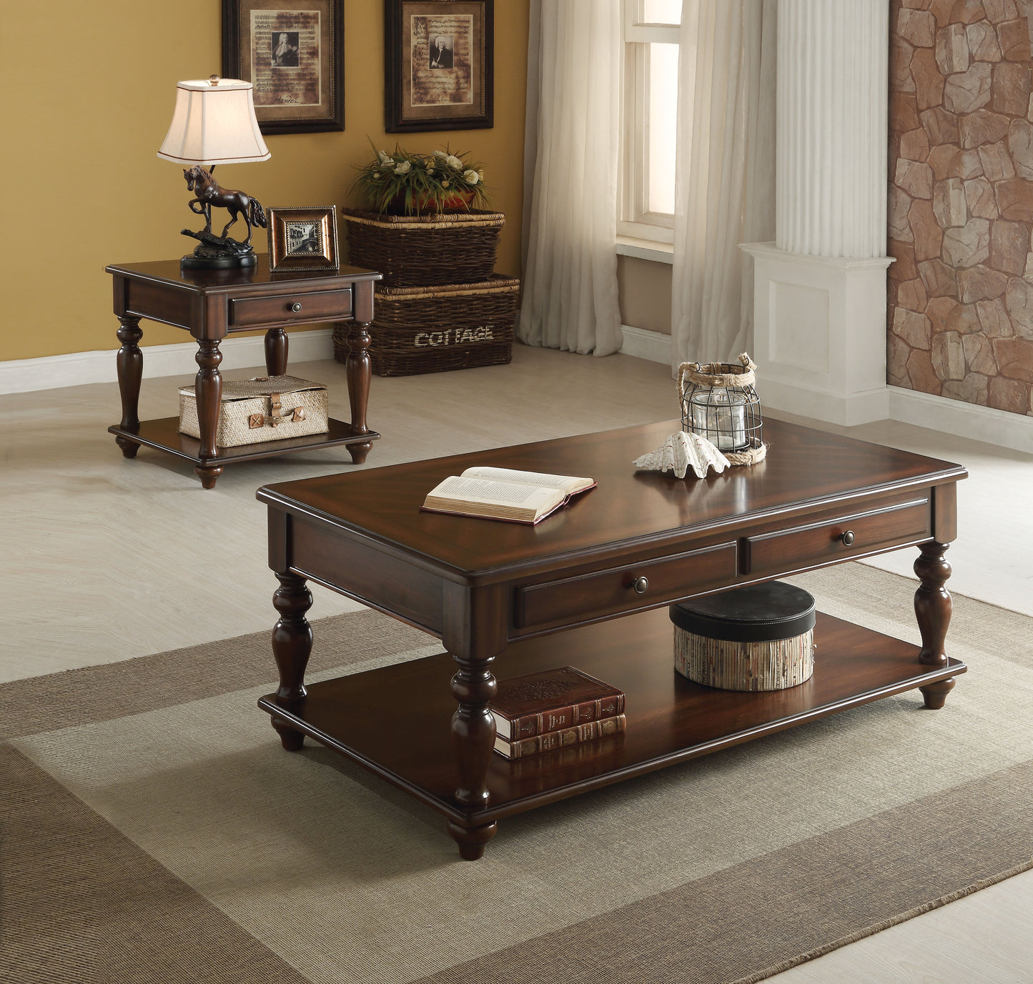 Dark wood rectangular coffee table with carved legs and two drawers holding an open book