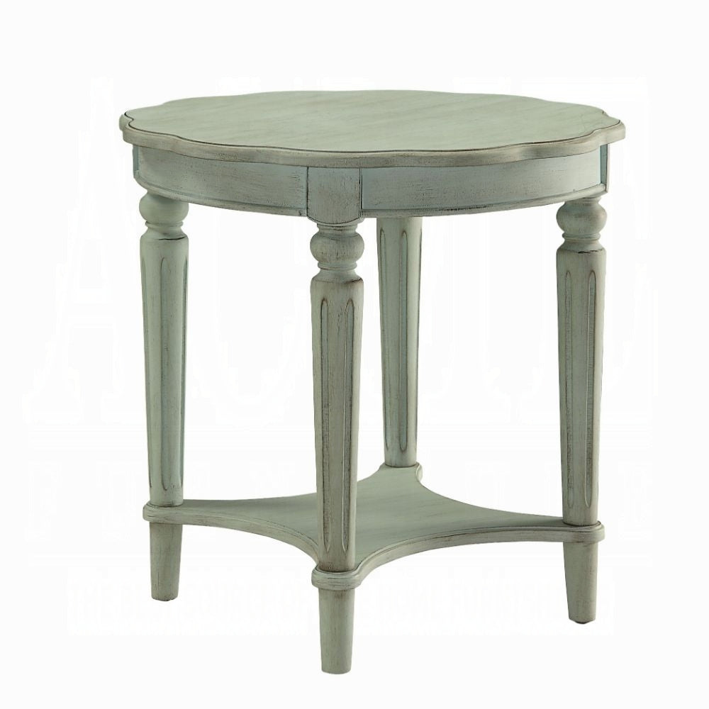 Distressed teal wood round end table with carved legs and lower shelf
