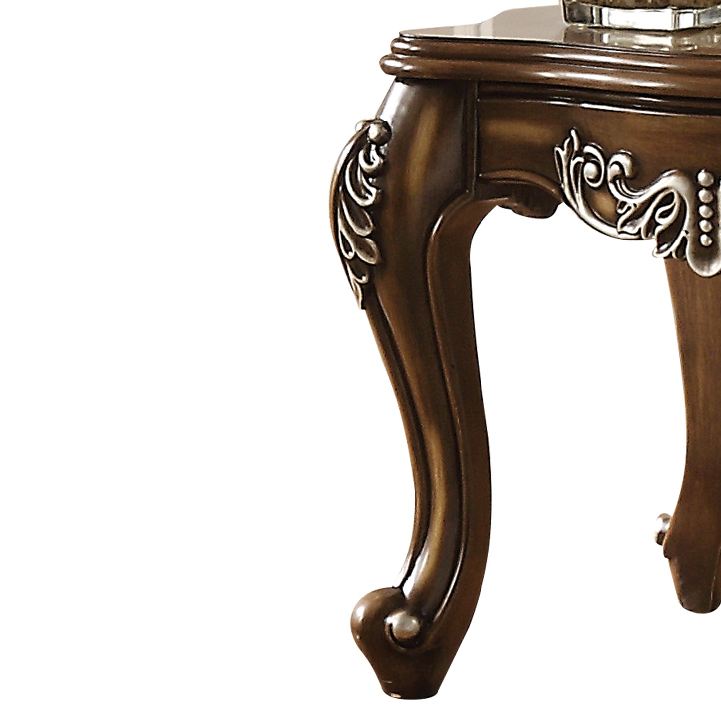 Antique mahogany side table leg with ornate silver inlay and carved detail