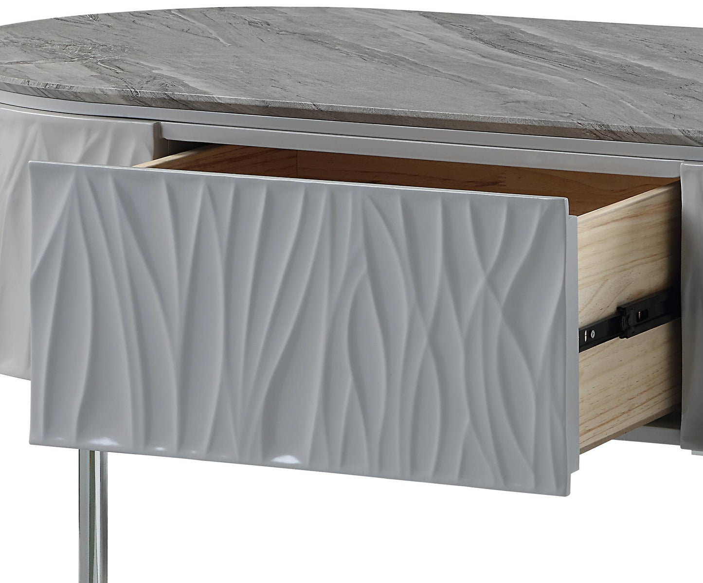 Gray textured drawer front on a modern oval dresser with a marblelook top