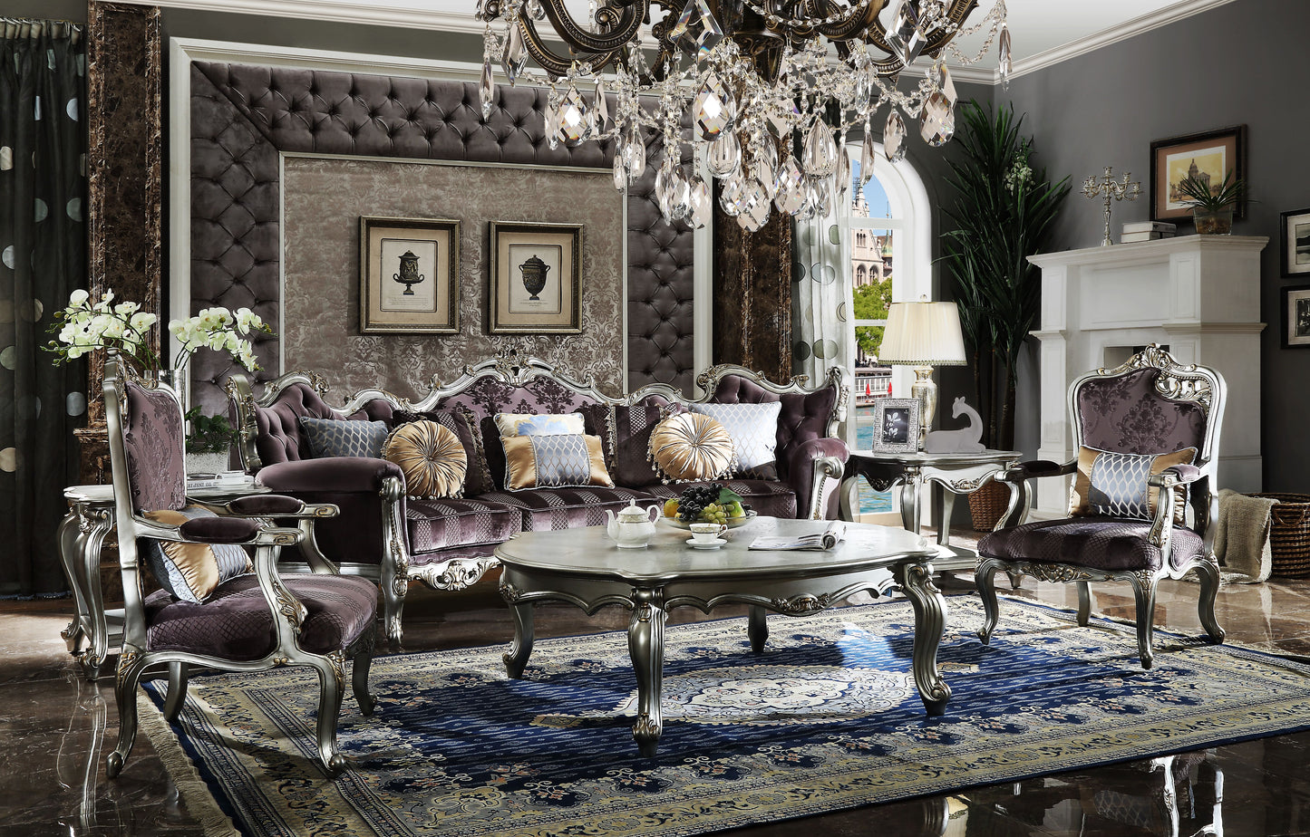 Opulent purple velvet sofa with intricate silver scrollwork and ornate throw pillows for a luxurious living room
