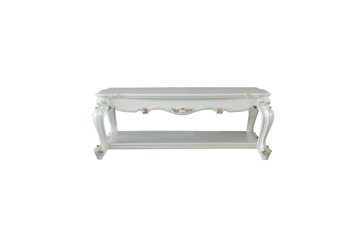 White ornate coffee table with carved gold accents and a lower shelf